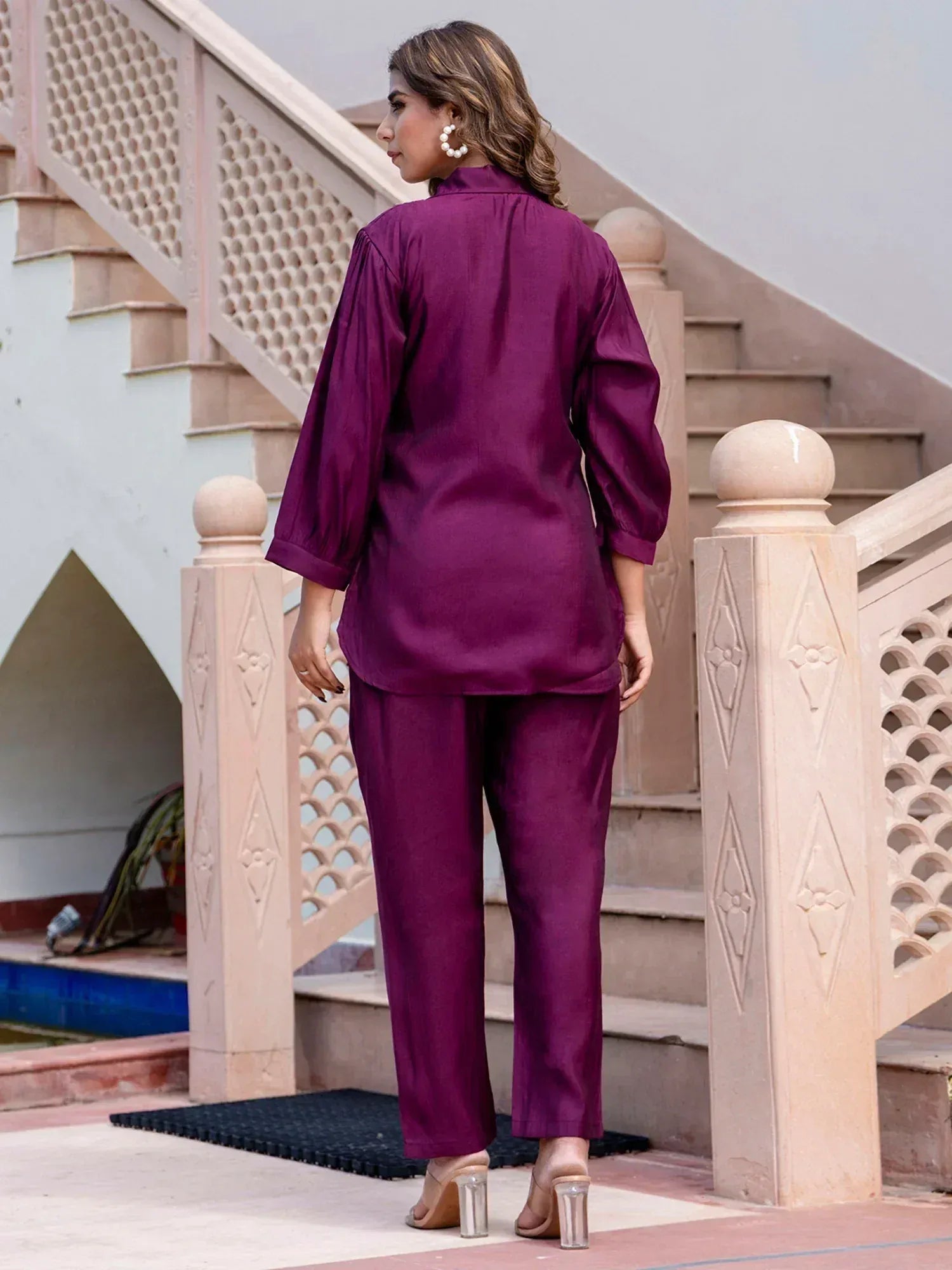Purple ethnic pantsuit with puff sleeves, styled for modern Indian wear