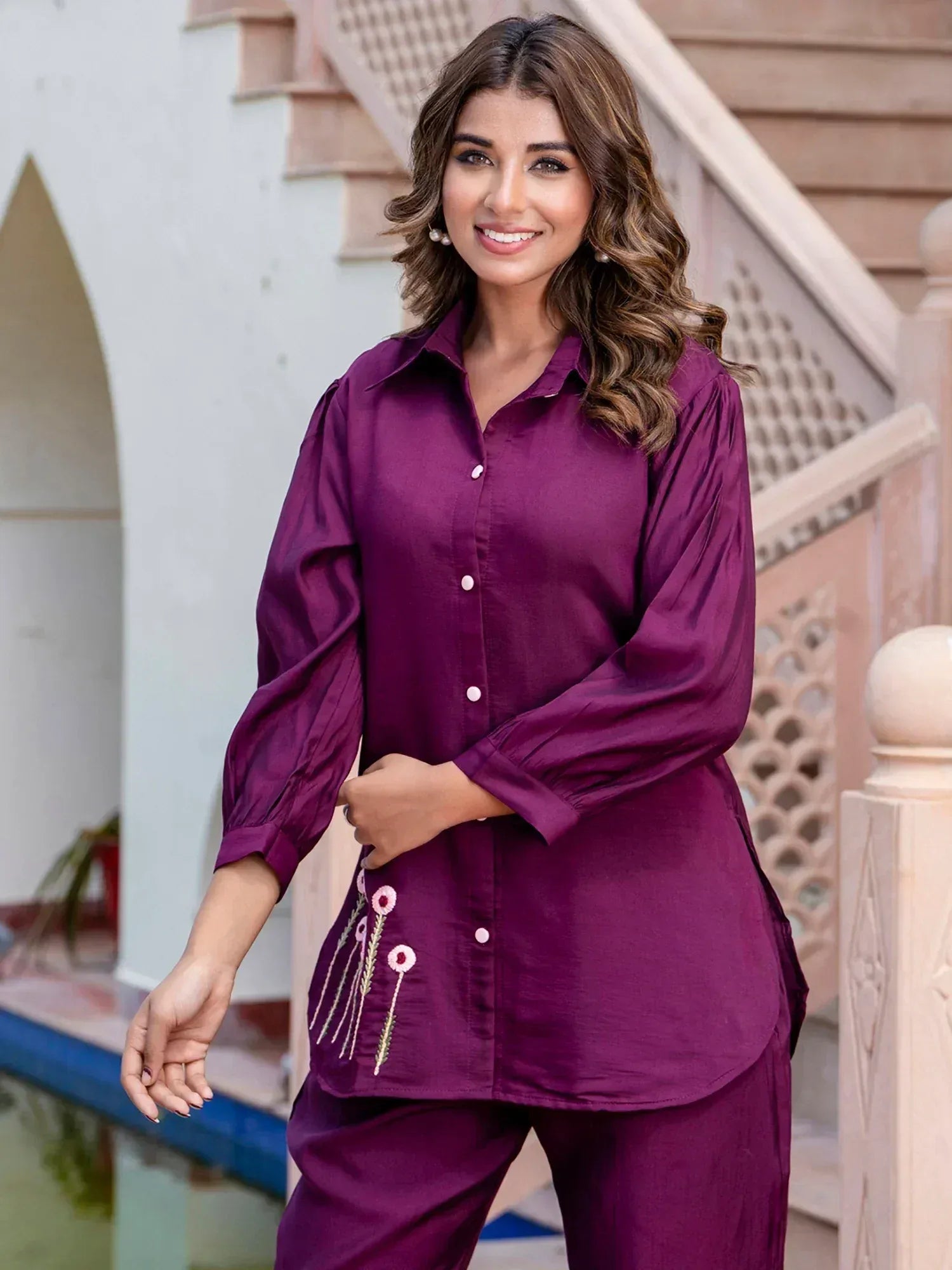 Purple embroidered kurta set with floral detailing, stylish ethnic wear for women
