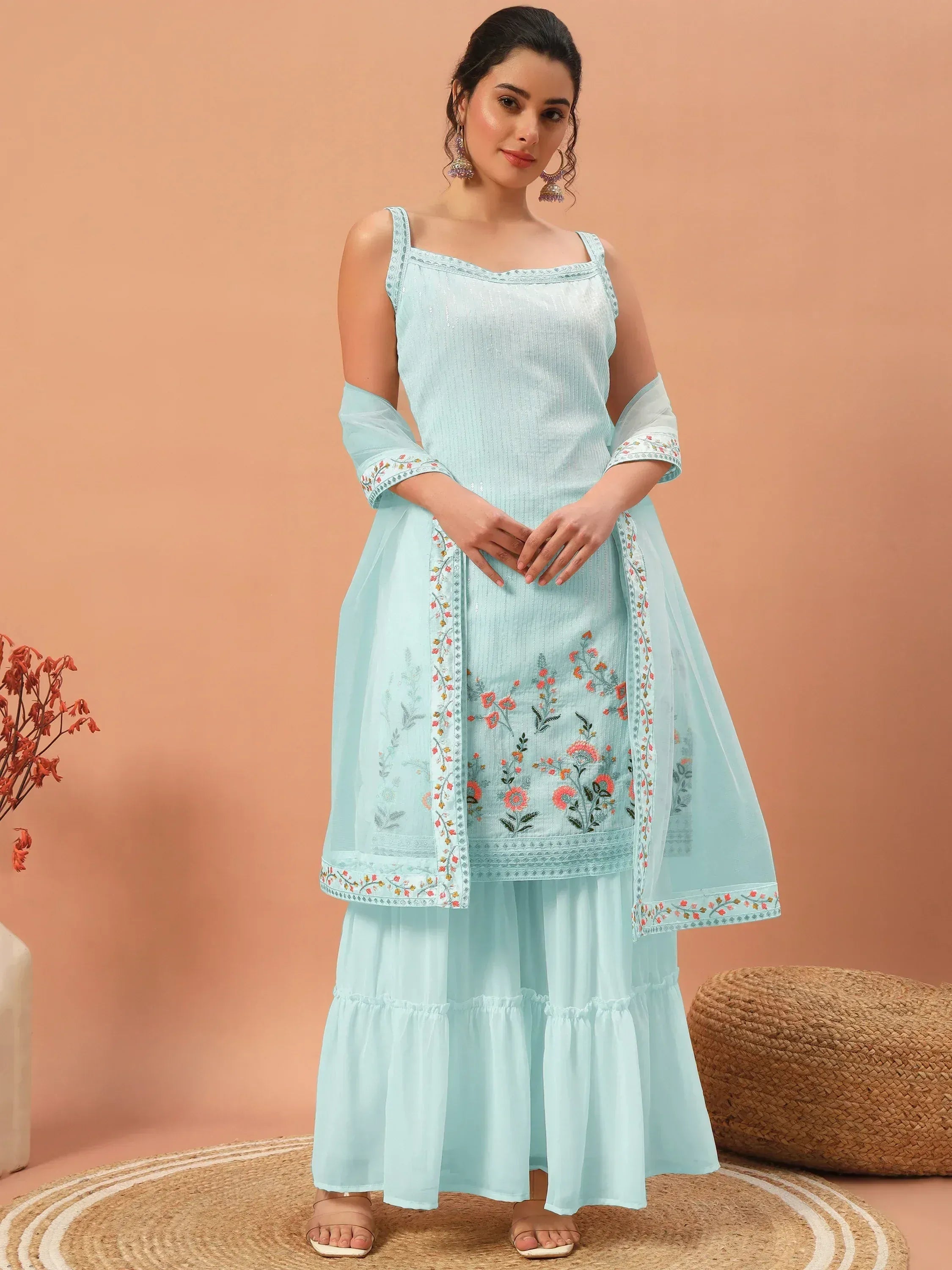 Light blue embroidered ethnic kurti with ruffled palazzo and dupatta, perfect for festive occasions