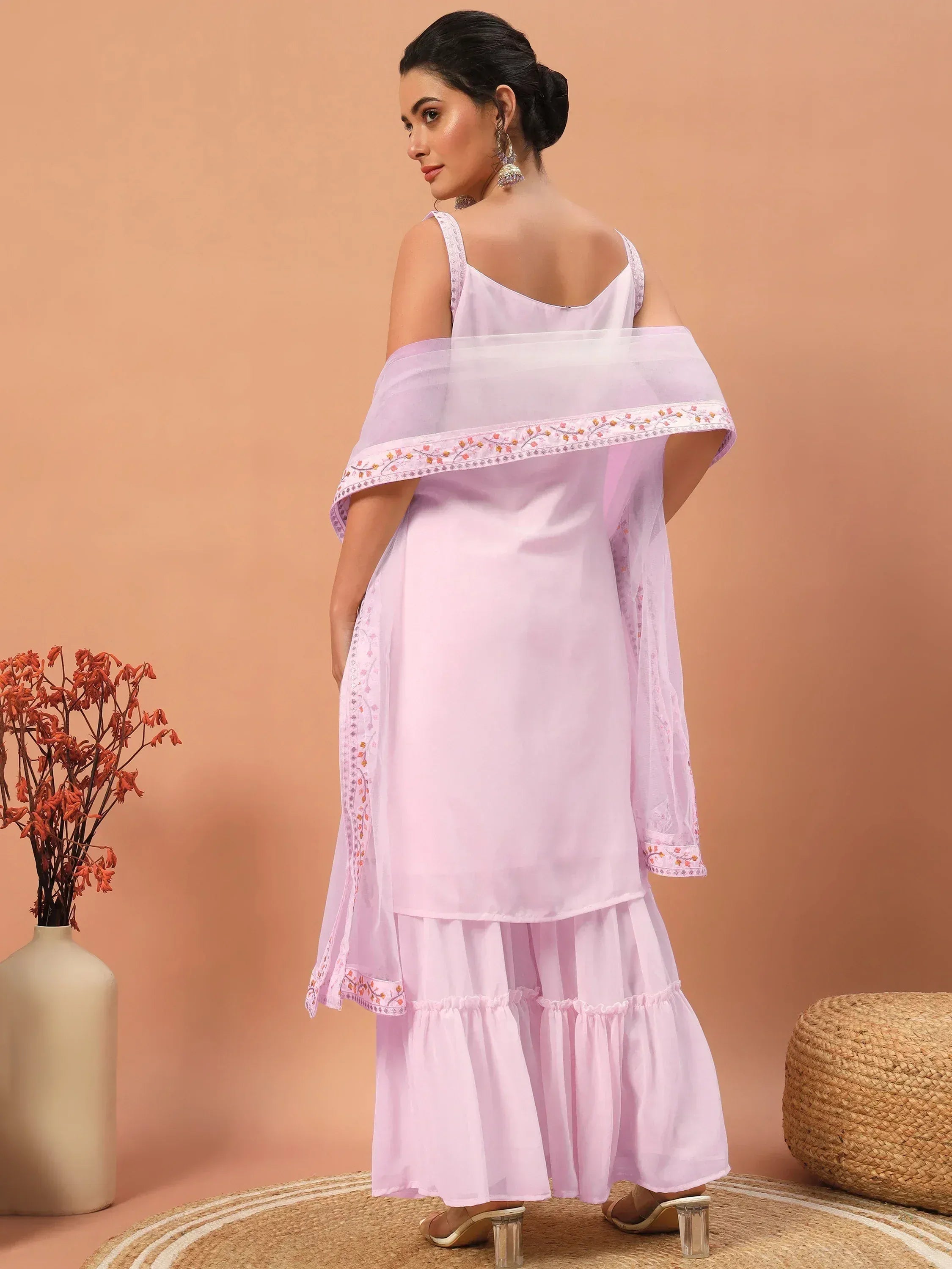 Light purple ethnic gown with embroidered dupatta and ruffled skirt, styled for Indian occasions