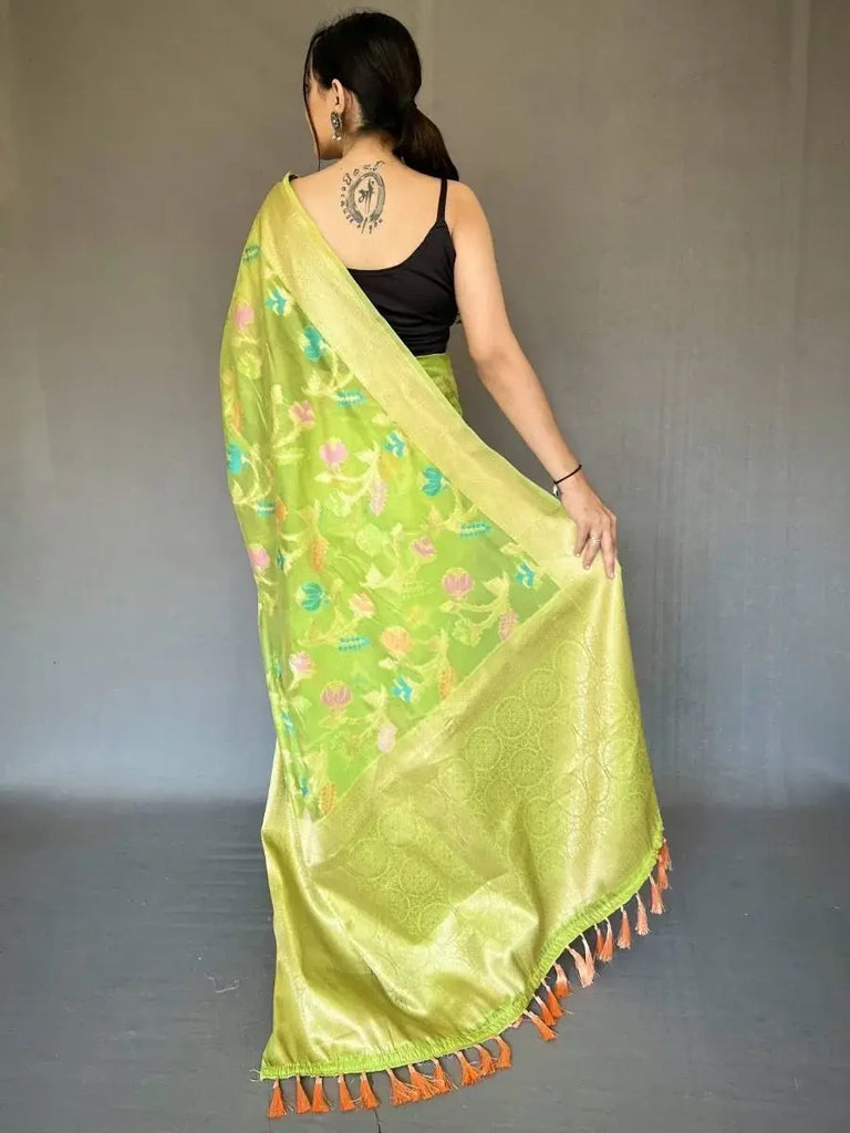 Ravishing Green Zari Woven Organza Events Wear Saree