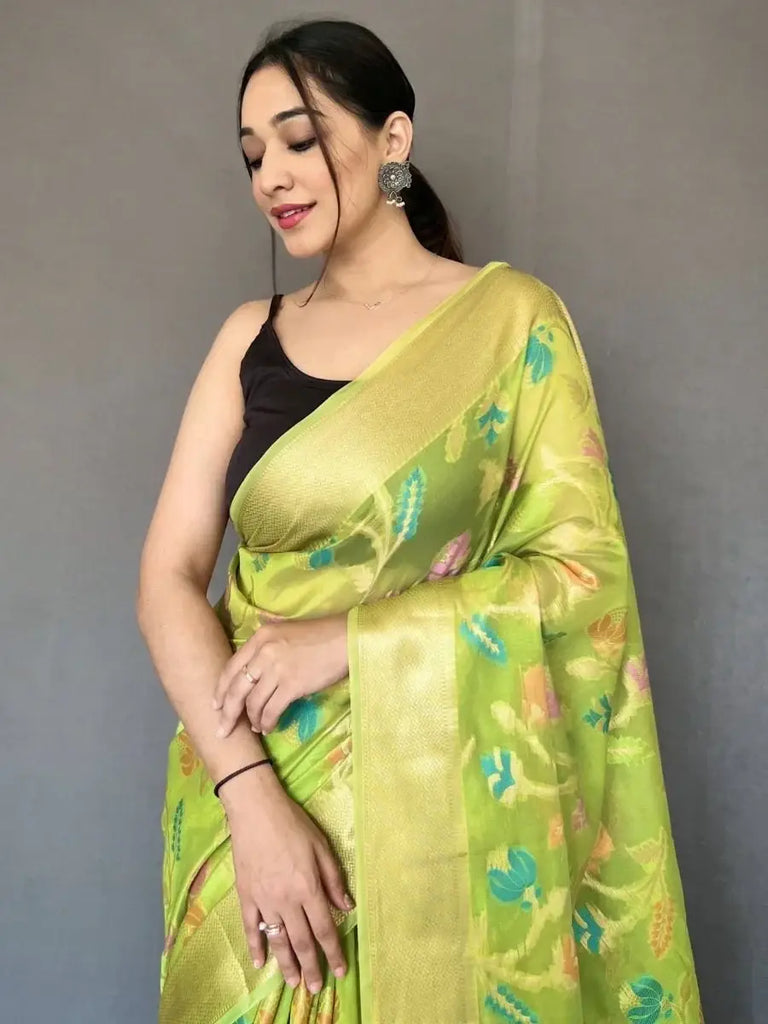 Ravishing Green Zari Woven Organza Events Wear Saree