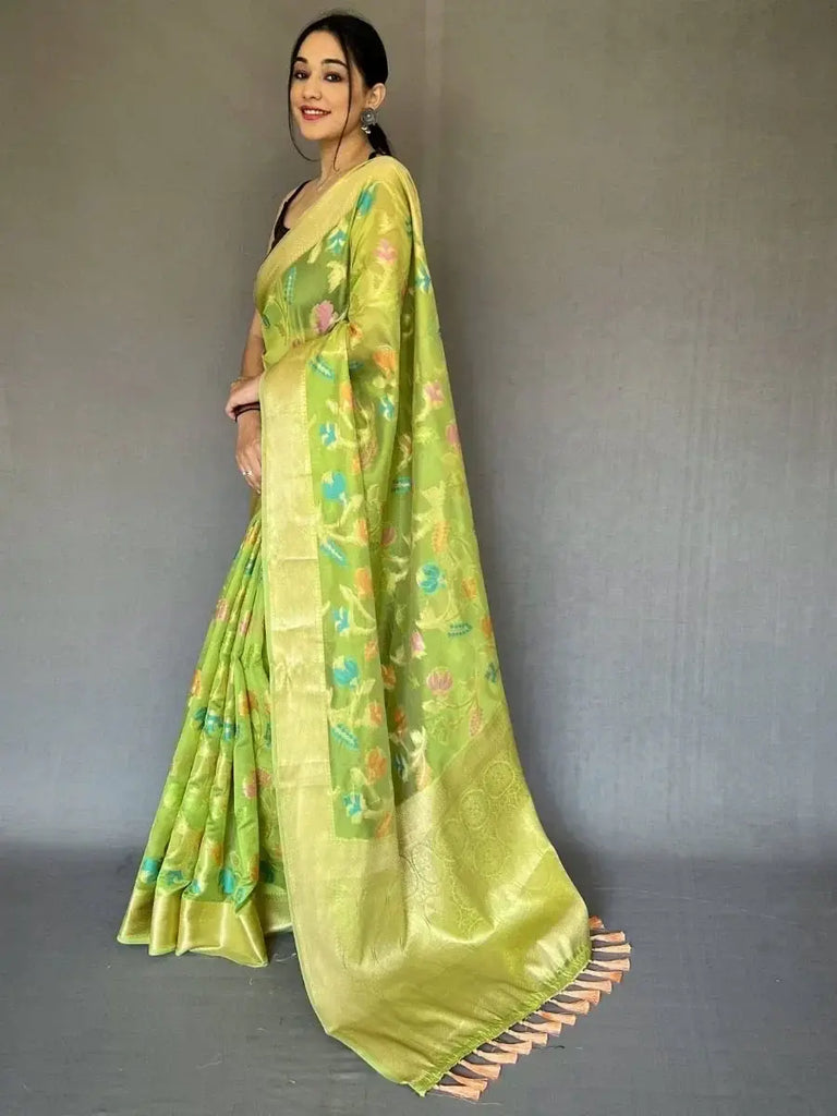 Ravishing Green Zari Woven Organza Events Wear Saree