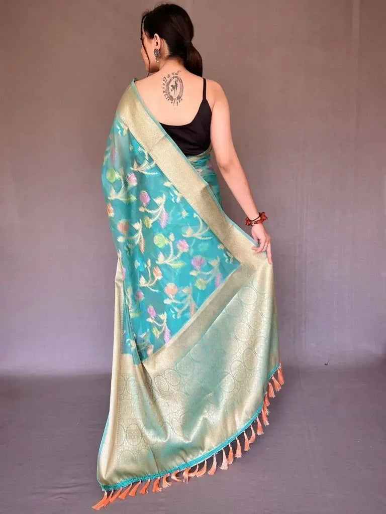 Captivating Teal Blue Woven Tissue Silk Festival Wear Saree