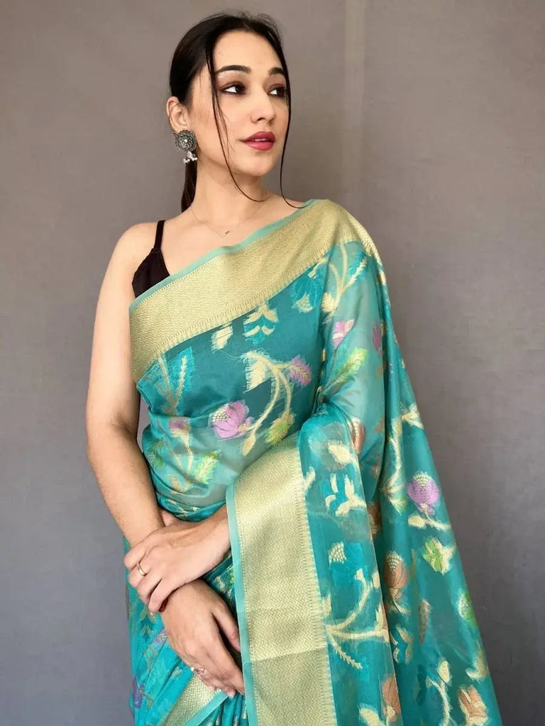 Captivating Teal Blue Woven Tissue Silk Festival Wear Saree