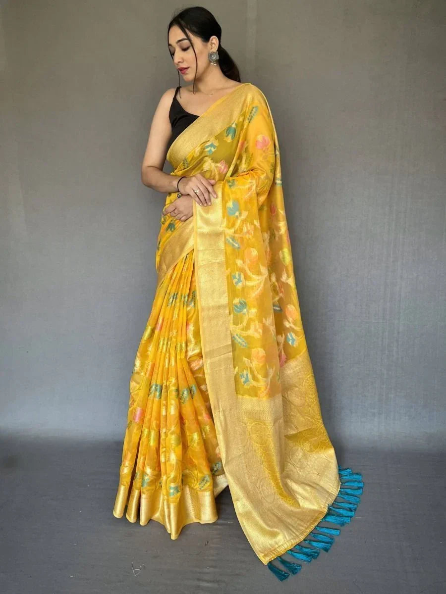 Fascinating Yellow Woven Tissue Silk Occasion Wear Saree