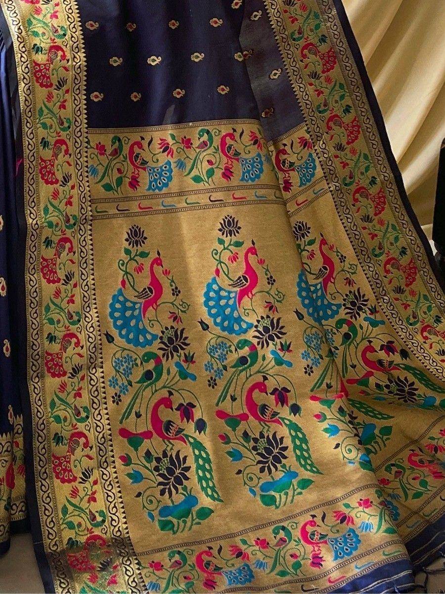 Vibrant peacock and floral embroidered saree with golden border, perfect for Indian ethnic wear