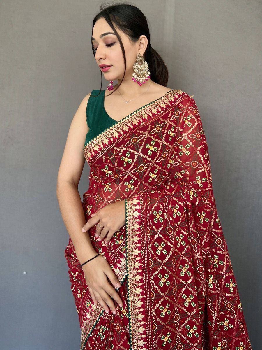 Red embroidered saree with green blouse, traditional Indian ethnic wear for women