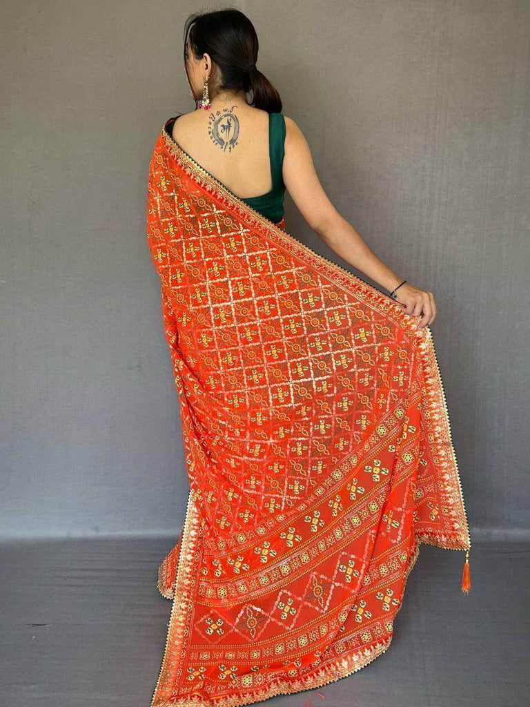 Pretty Orange Bandhani Print Georgette Festive Saree With Blouse