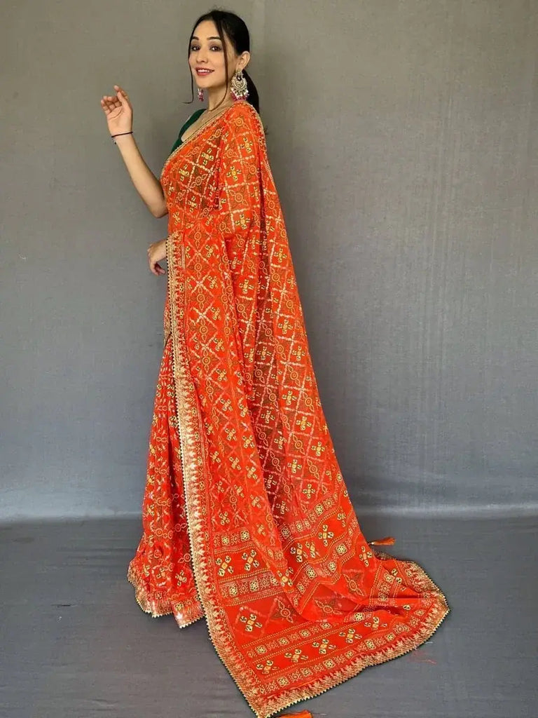 Pretty Orange Bandhani Print Georgette Festive Saree With Blouse
