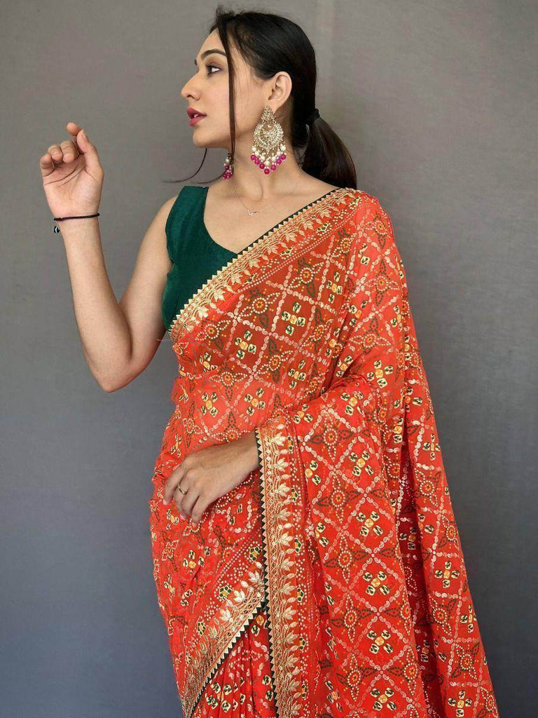 Pretty Orange Bandhani Print Georgette Festive Saree With Blouse