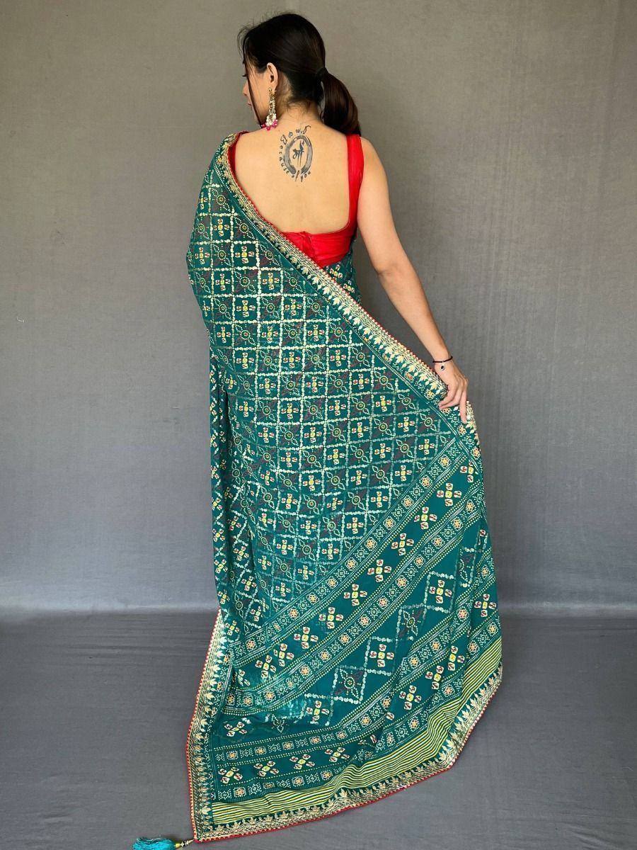 Teal printed saree with gold motifs and red blouse, Indian ethnic wear for women