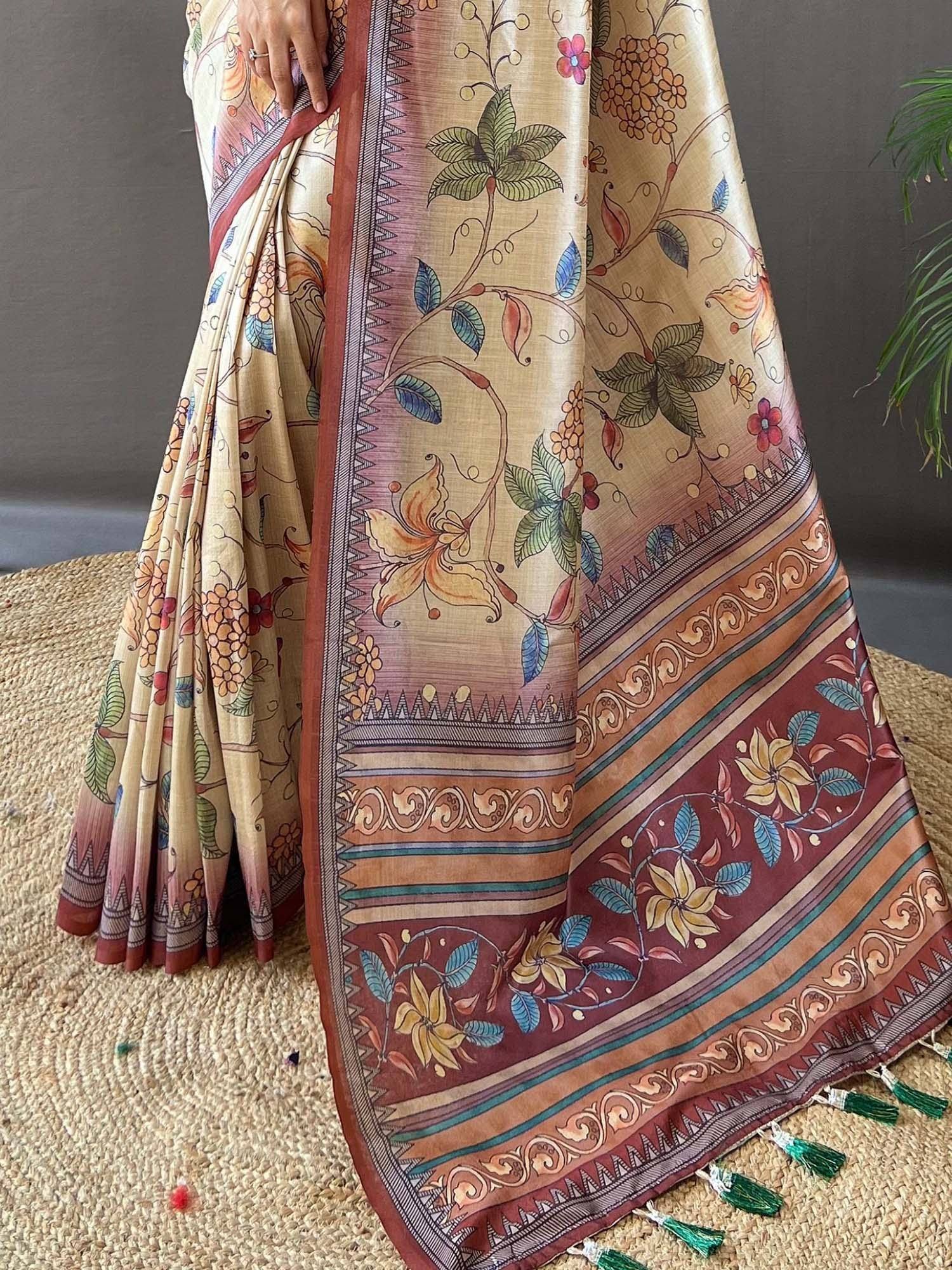 Floral printed saree with intricate border and tassels, ethnic Indian wear
