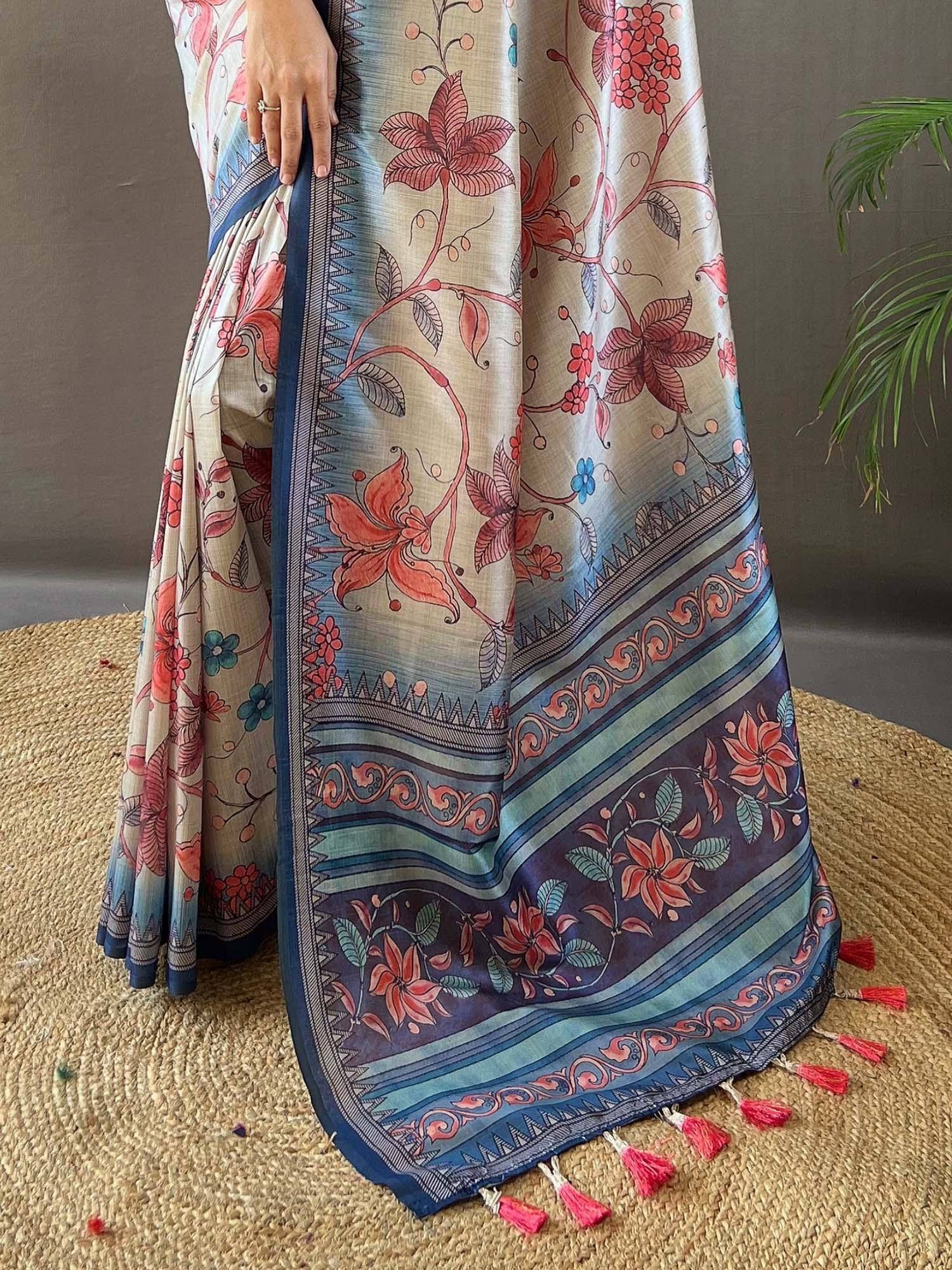 Floral printed saree with blue border and tassels, ethnic Indian wear