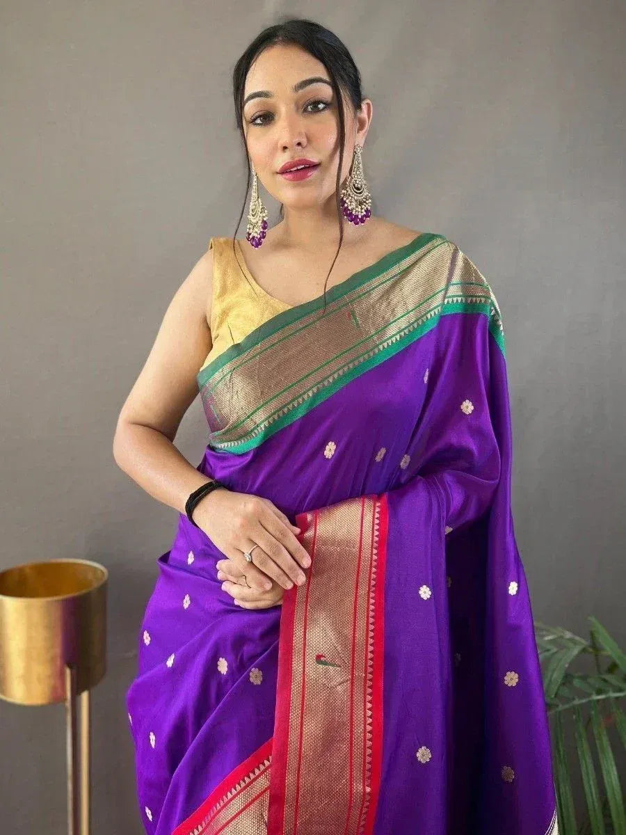 Purple silk saree with gold and green border, paired with yellow blouse, perfect for Indian ethnic wear occasions