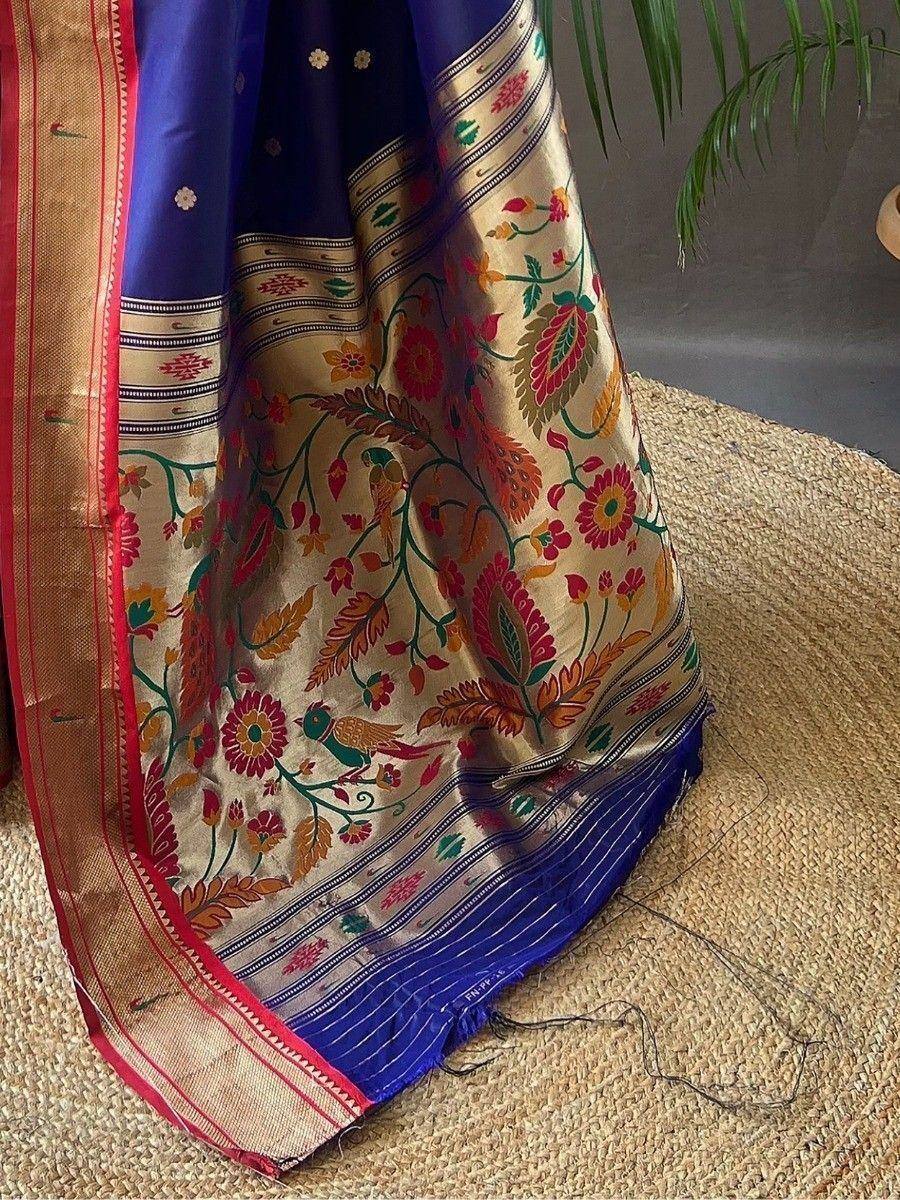 Blue and gold floral embroidered saree with bird motifs, perfect for Indian ethnic wear occasions.