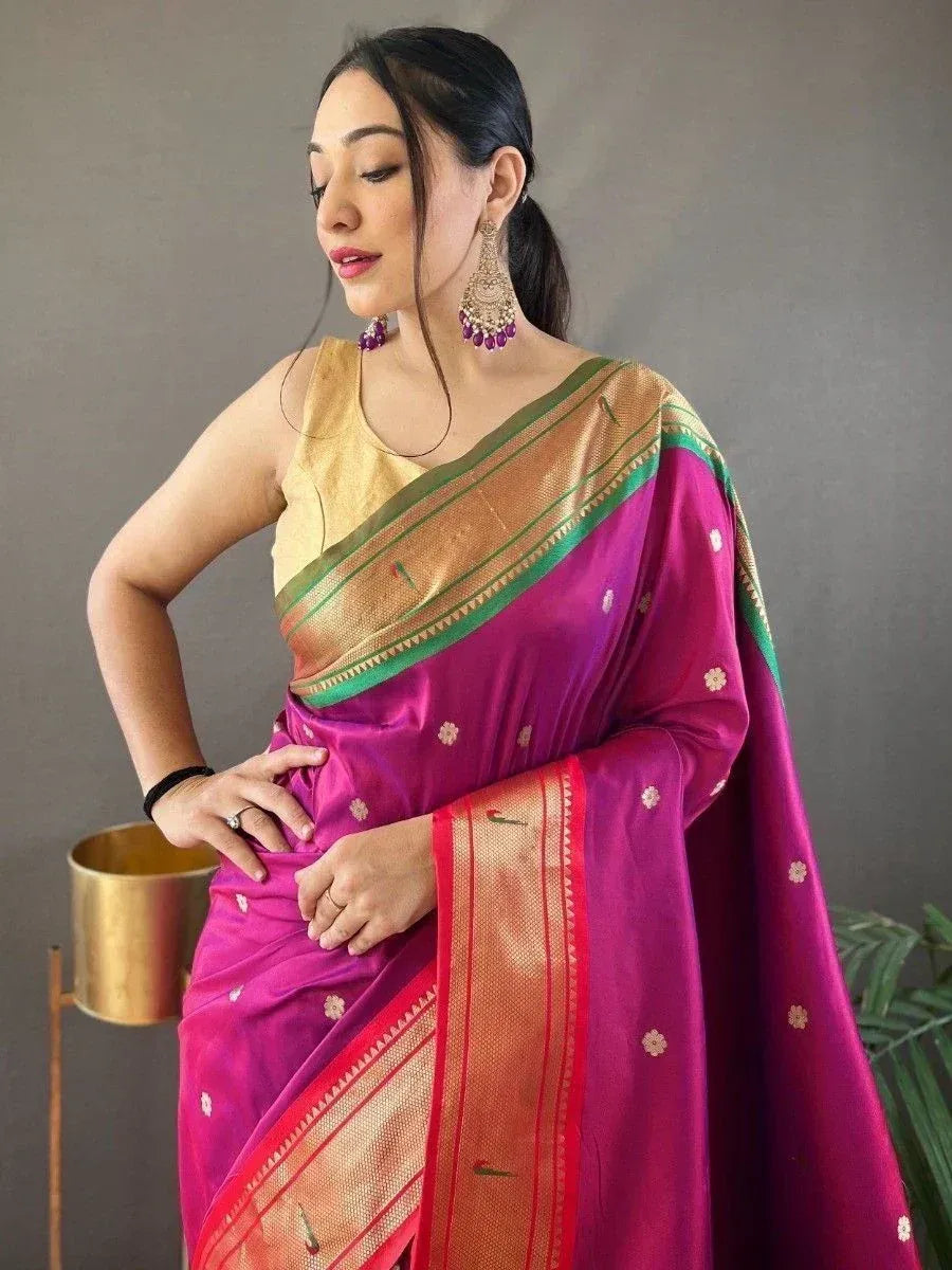Vibrant magenta saree with gold and green border, paired with golden blouse, perfect for Indian ethnic wear