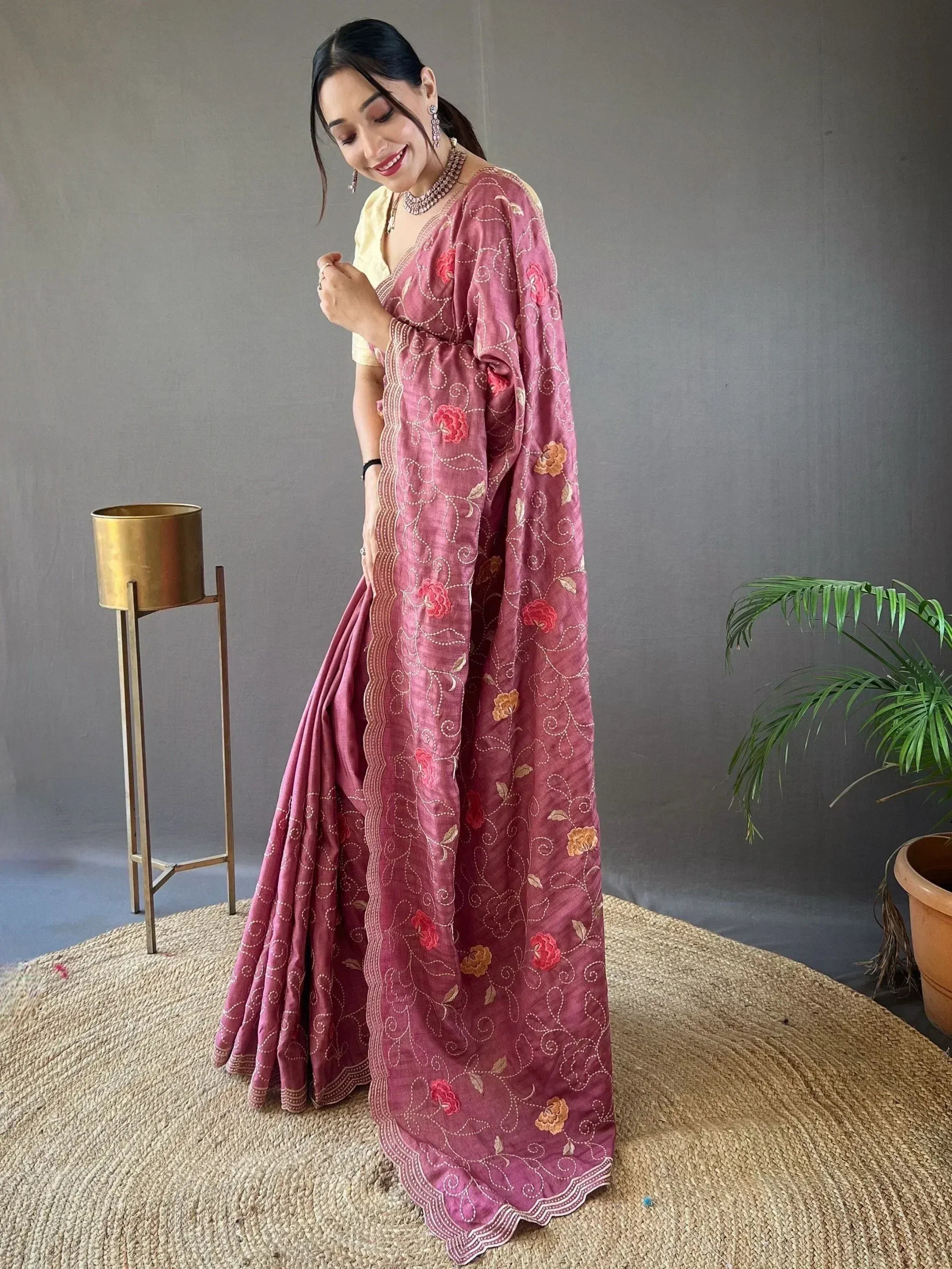 Pink floral embroidered ethnic gown with yellow blouse, perfect for Indian occasions and festive wear.