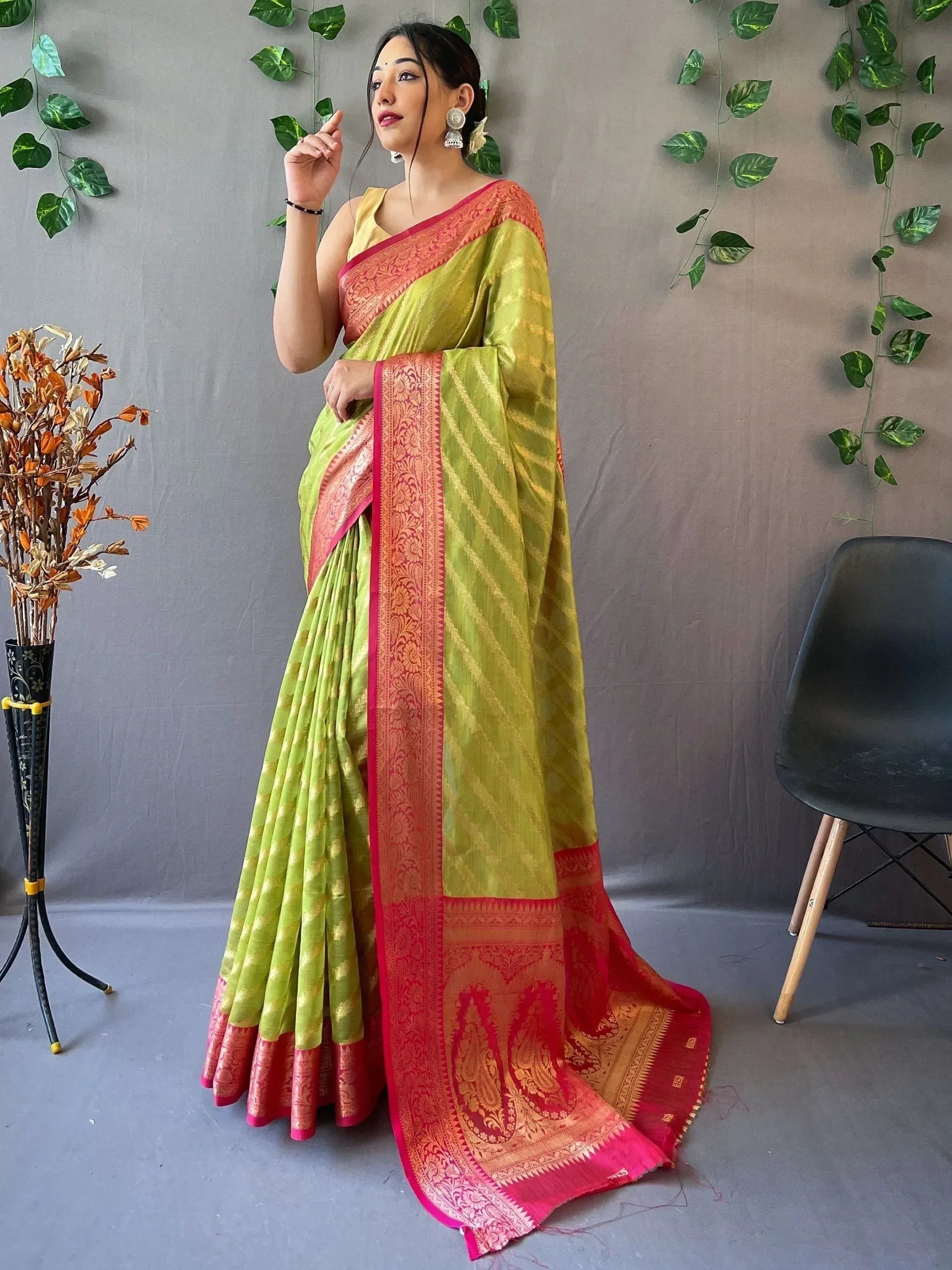Lime green and red designer saree with gold zari work, perfect for Indian ethnic wear occasions