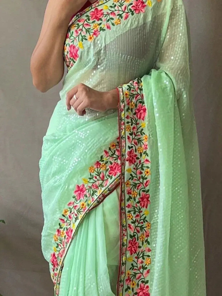 Stunning Pista Green Sequins Georgette Reception Wear Saree