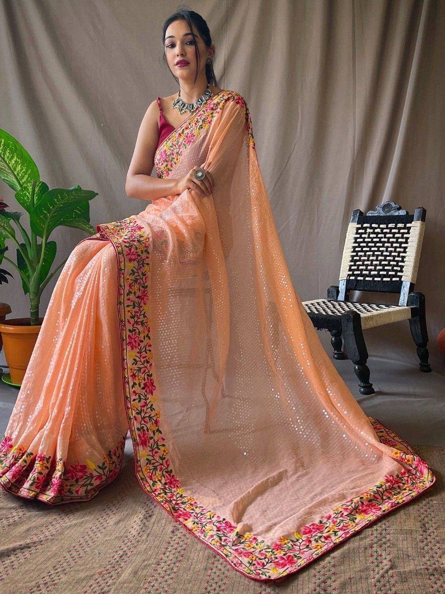 Elegant peach saree with floral embroidery and sequin detailing, perfect for Indian ethnic wear