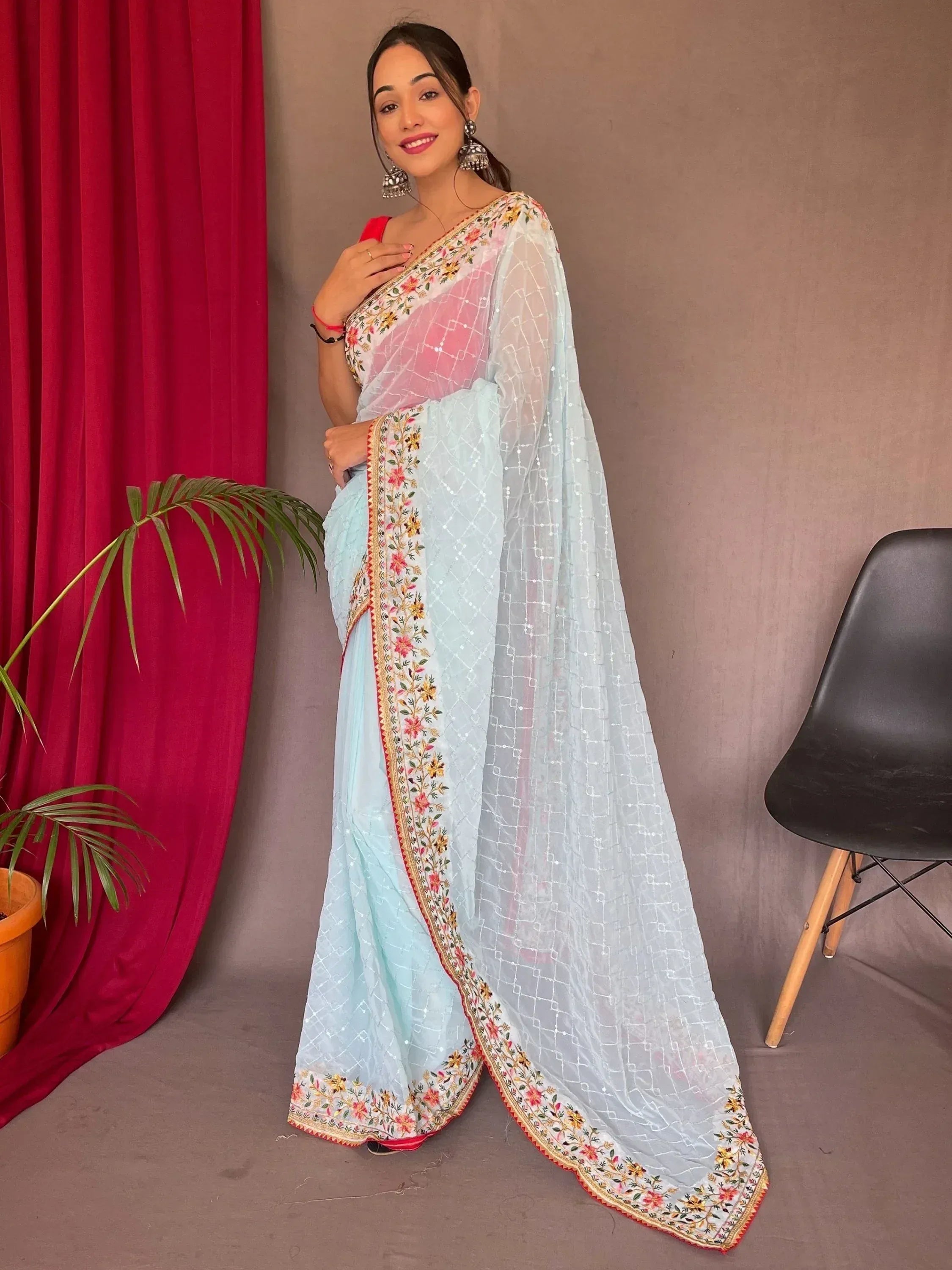 Light blue embroidered saree with floral border and pink blouse, Indian ethnic wear
