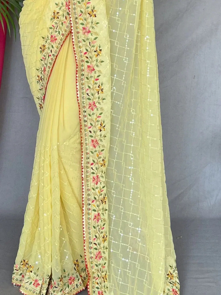 Bewitching Yellow Sequins Georgette Haldi Wear Saree With Blouse