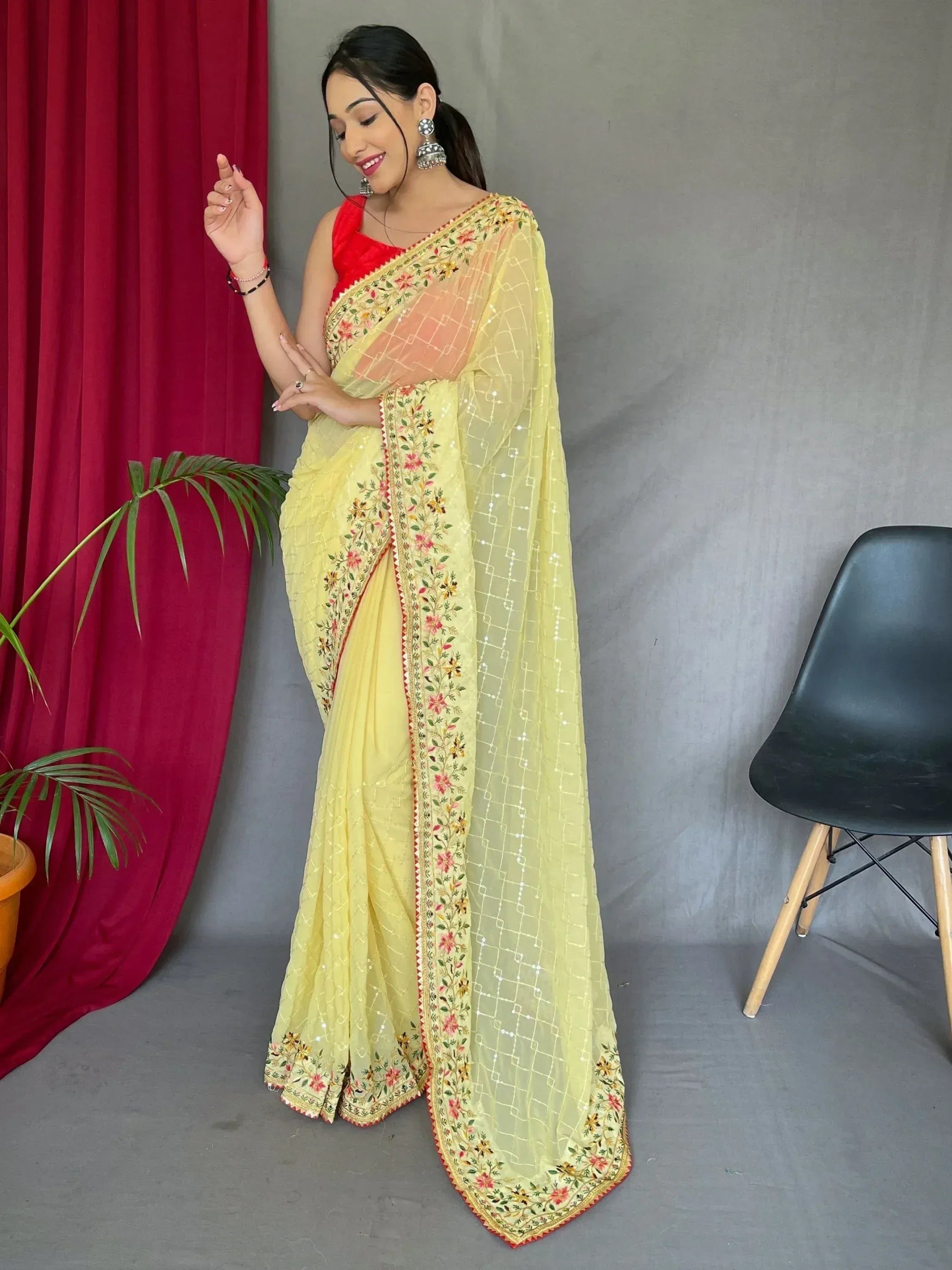 Bewitching Yellow Sequins Georgette Haldi Wear Saree With Blouse