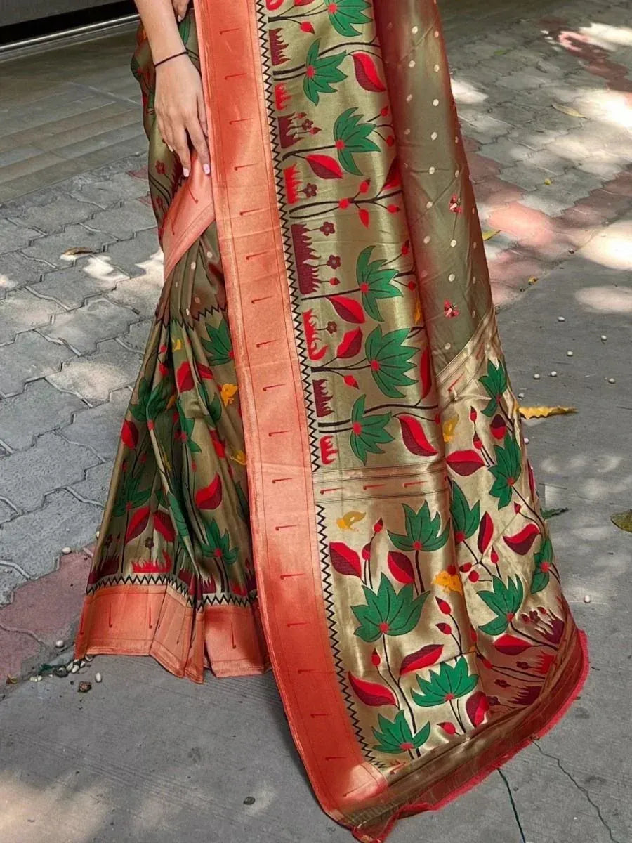 Indian ethnic saree with green red floral print and orange border, stylish traditional wear