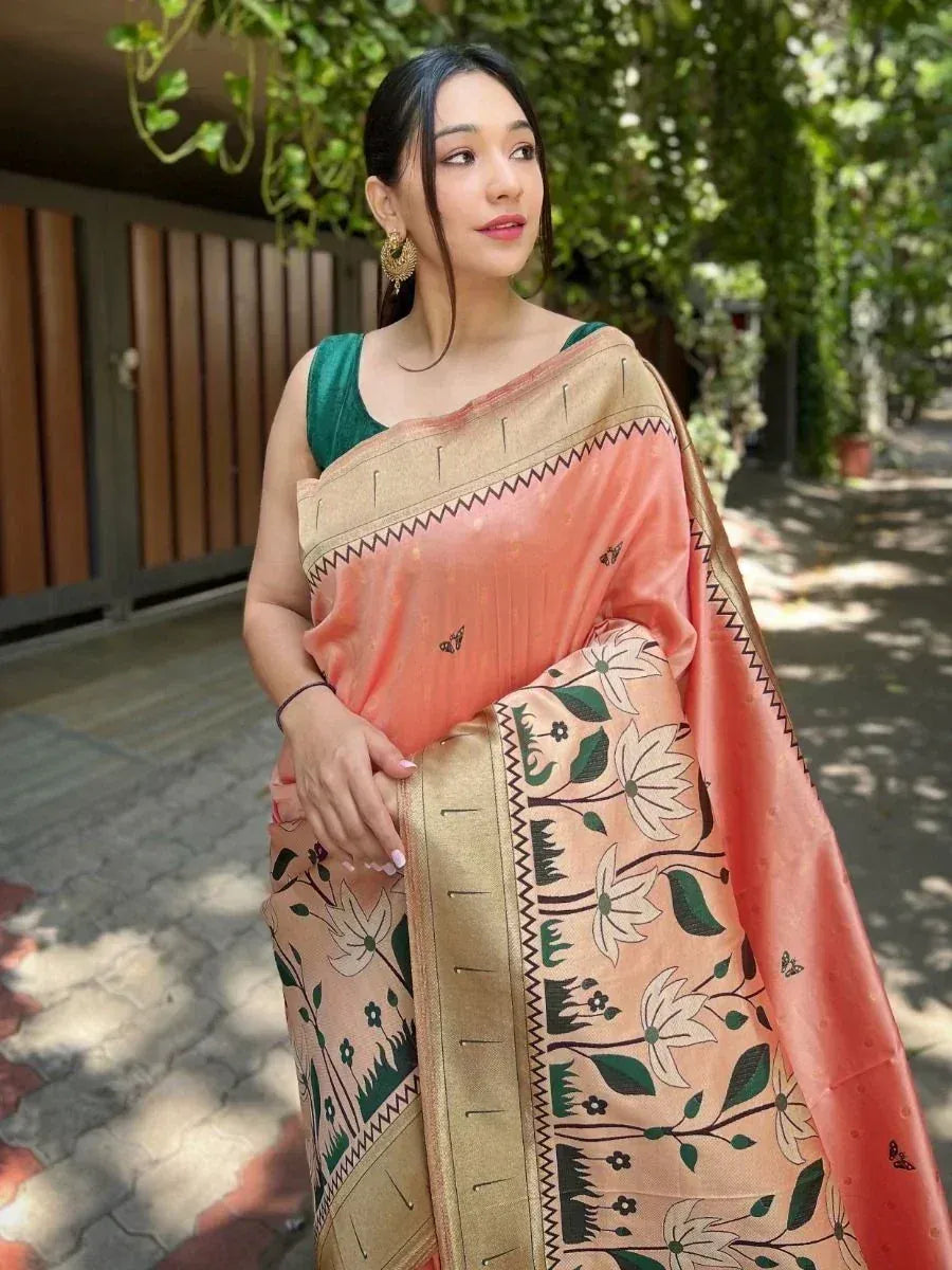 Woman in peach floral saree with green blouse, ethnic Indian wear for festive occasions