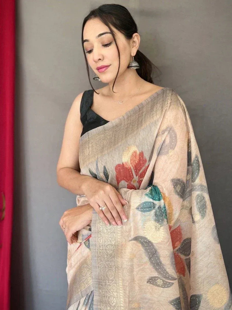 Woman wearing floral printed saree with black blouse, ethnic Indian wear