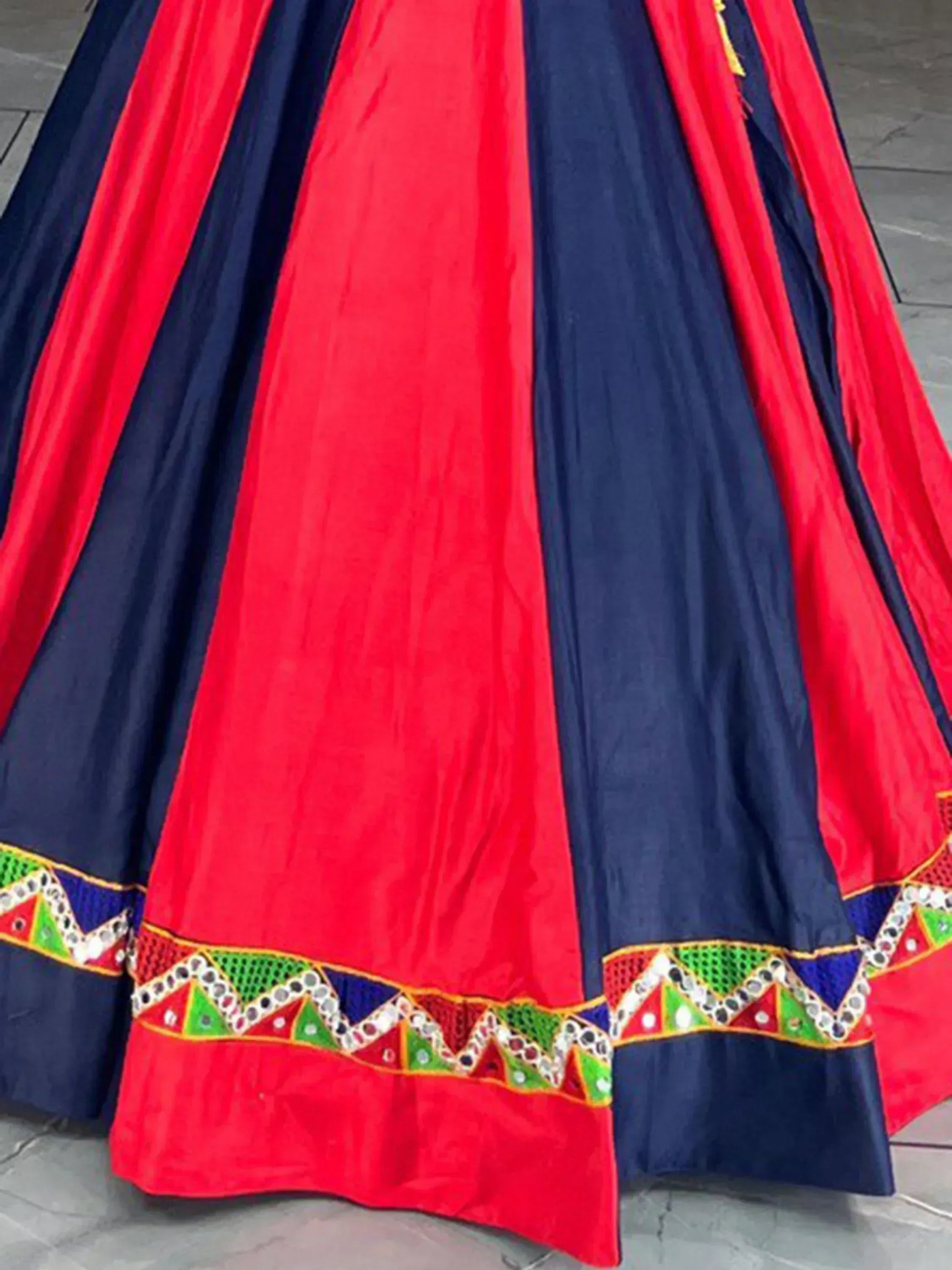 Red and navy blue ethnic lehenga with mirror work border, traditional Indian wear