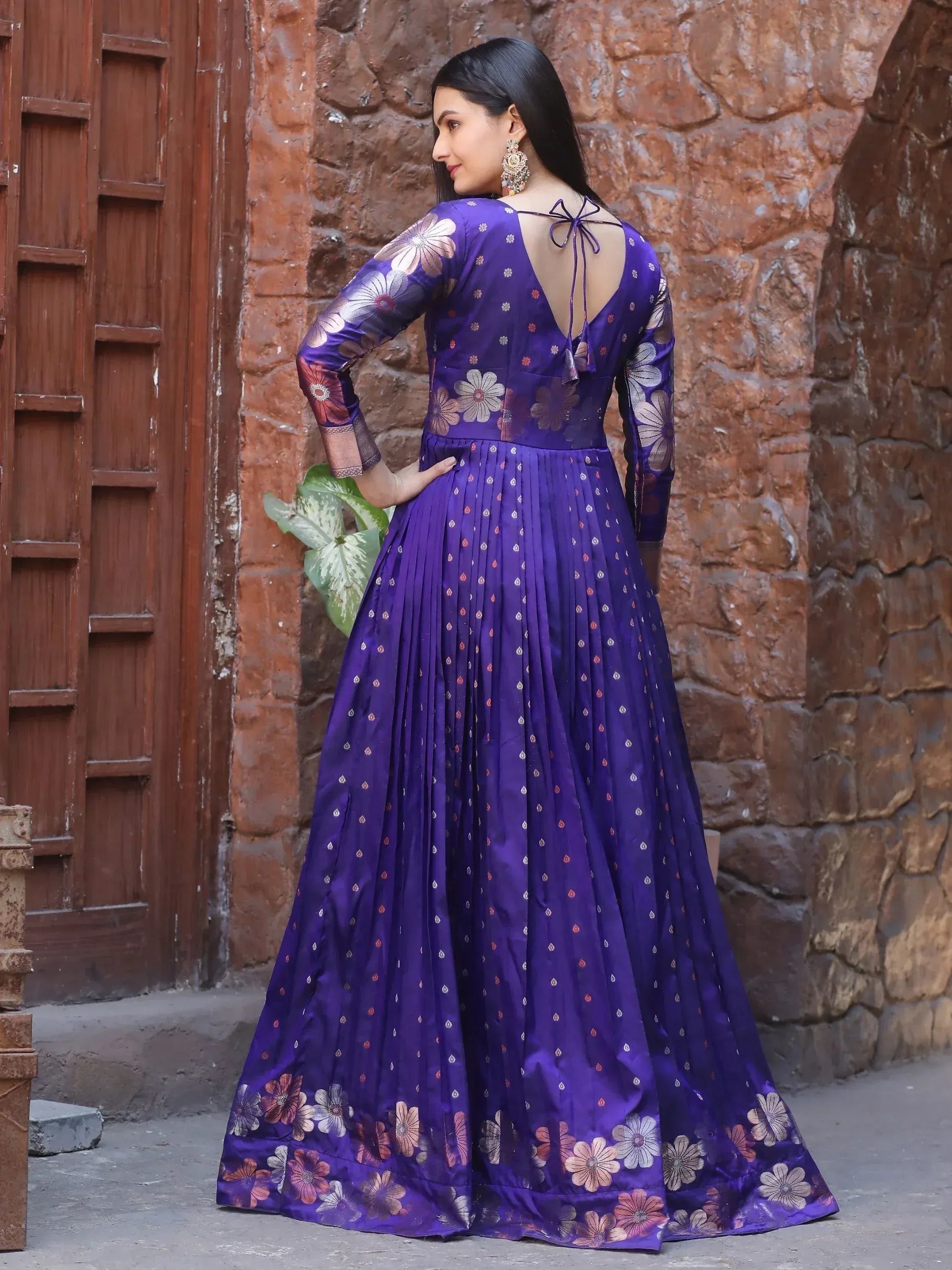 Purple floral ethnic gown with back tie detail, perfect for Indian occasions and festive wear.