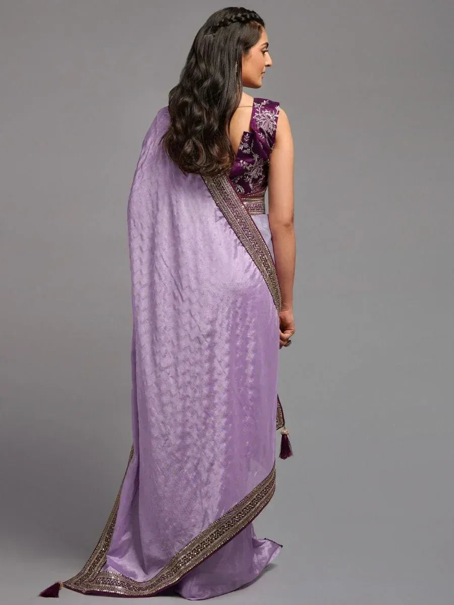 Lavender saree with gold border and purple embroidered blouse, ethnic Indian wear