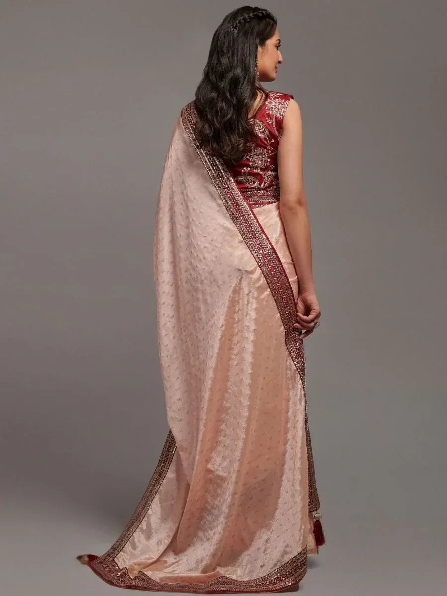 Elegant peach saree with maroon border and embroidered blouse, Indian ethnic wear