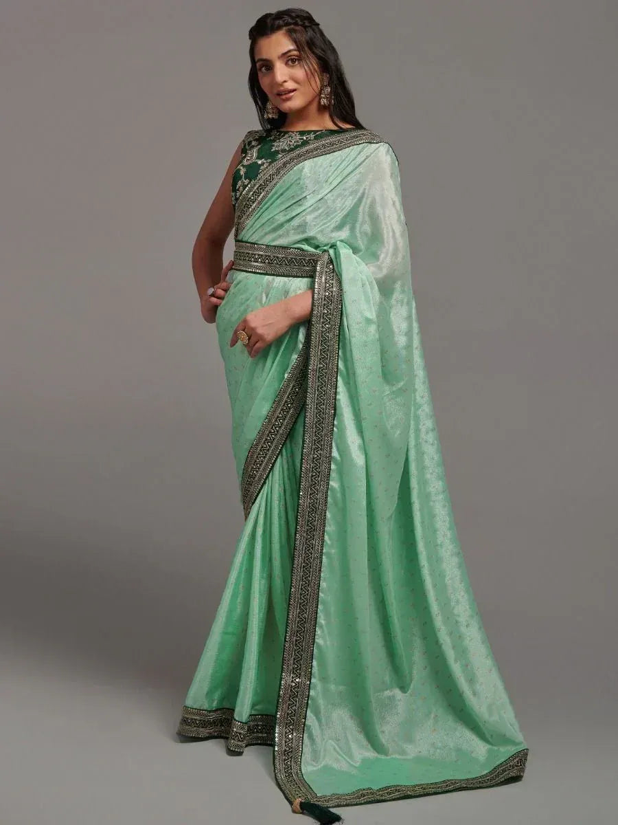 Mint green saree with embroidered border and matching blouse, elegant Indian ethnic wear