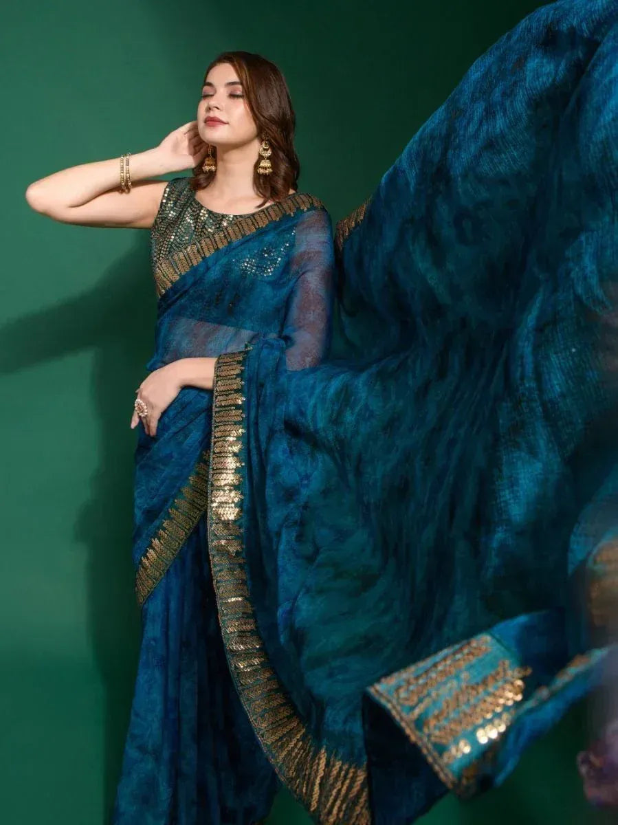 Elegant blue designer saree with gold sequin border, perfect for Indian ethnic occasions