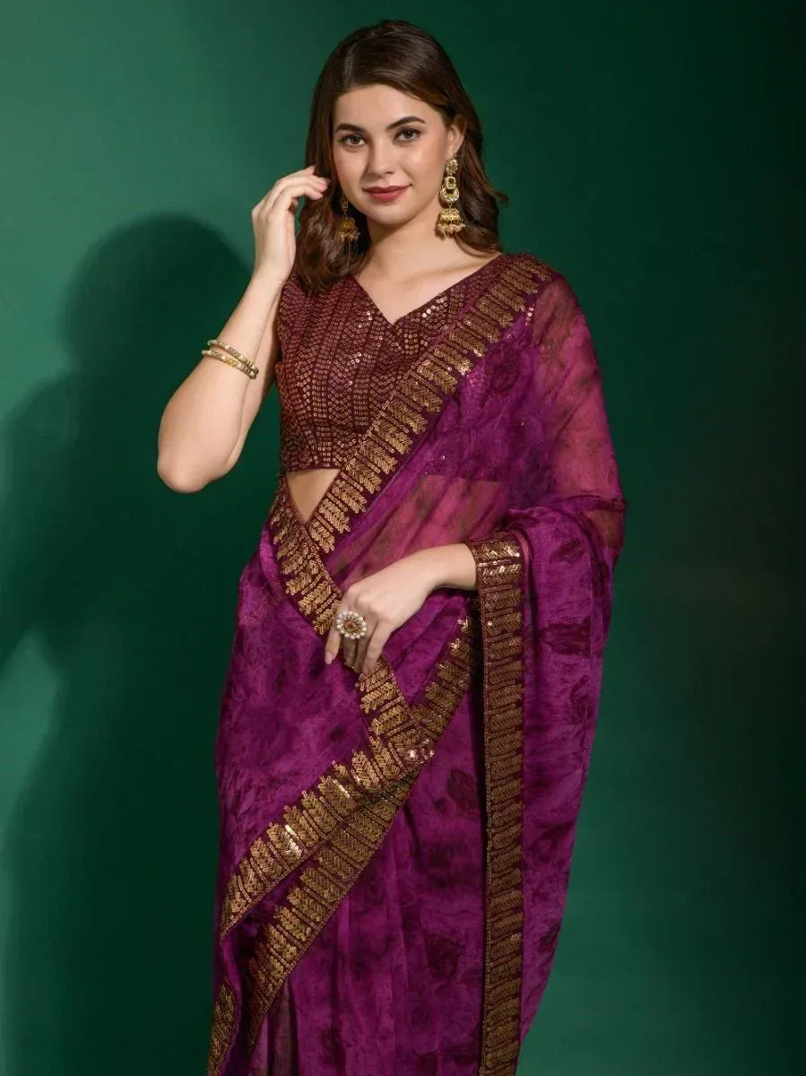 Purple ethnic saree with gold embroidery and sequin blouse, perfect for Indian occasions