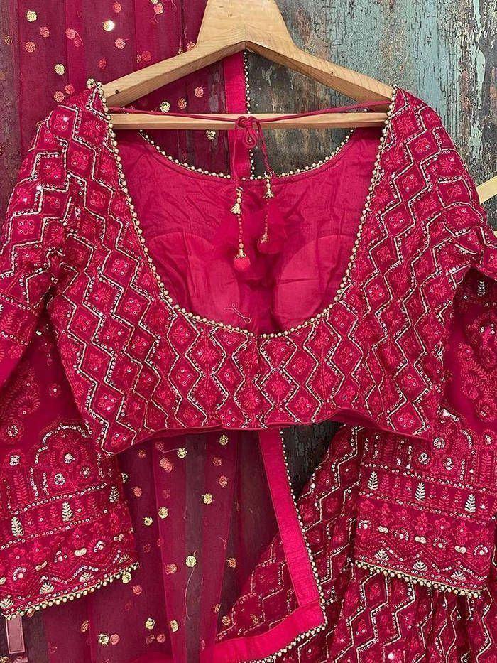 Red embroidered lehenga choli with gold detailing, perfect for Indian ethnic wear occasions