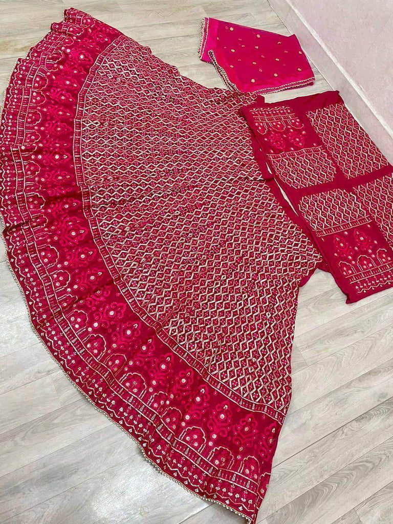 Marvelous Rani Pink Sequins Embroidredy Georgette Wedding Wear Lehenga Choli