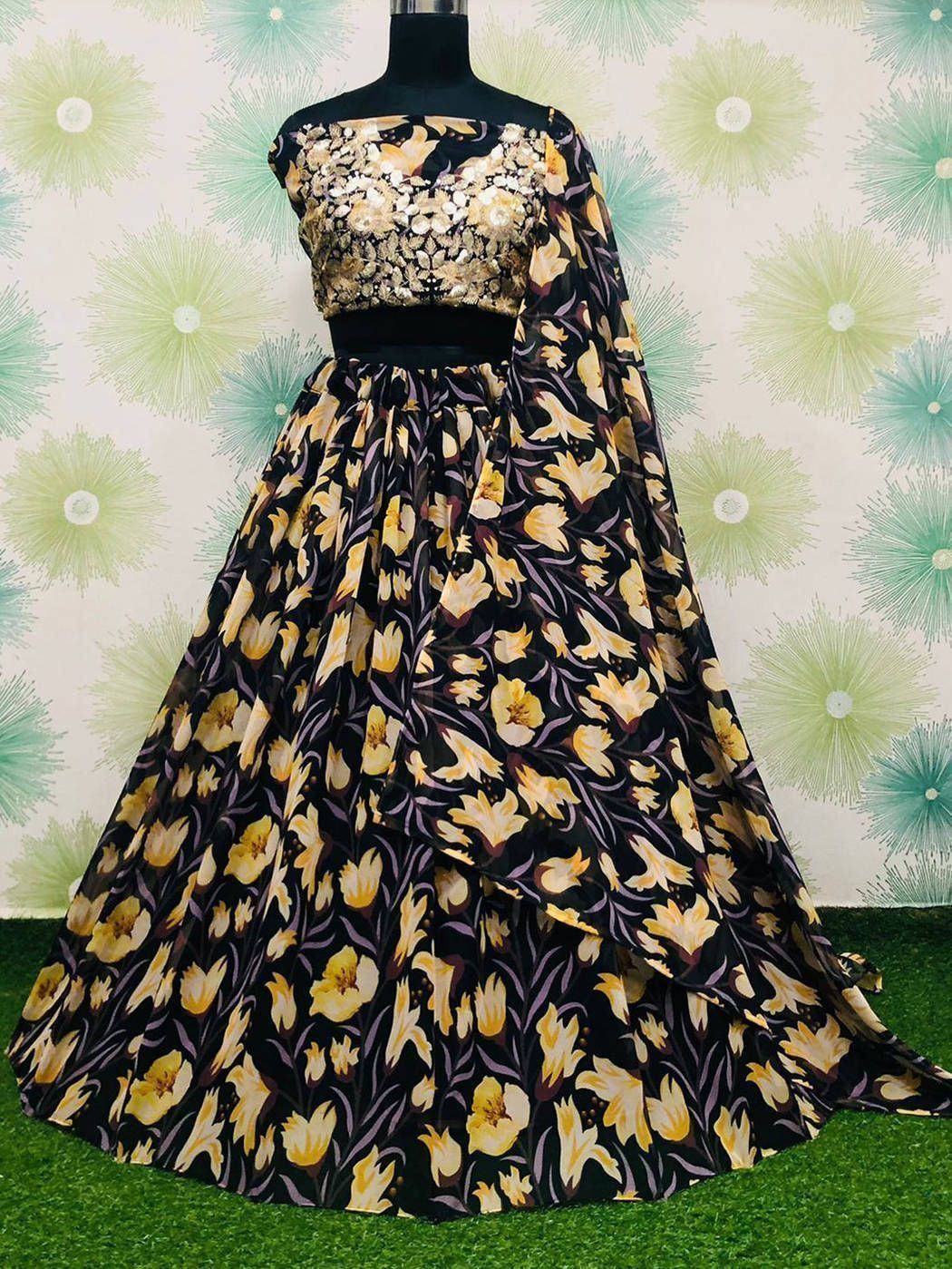 Black and gold floral lehenga choli with sequin blouse, perfect for Indian ethnic wear events