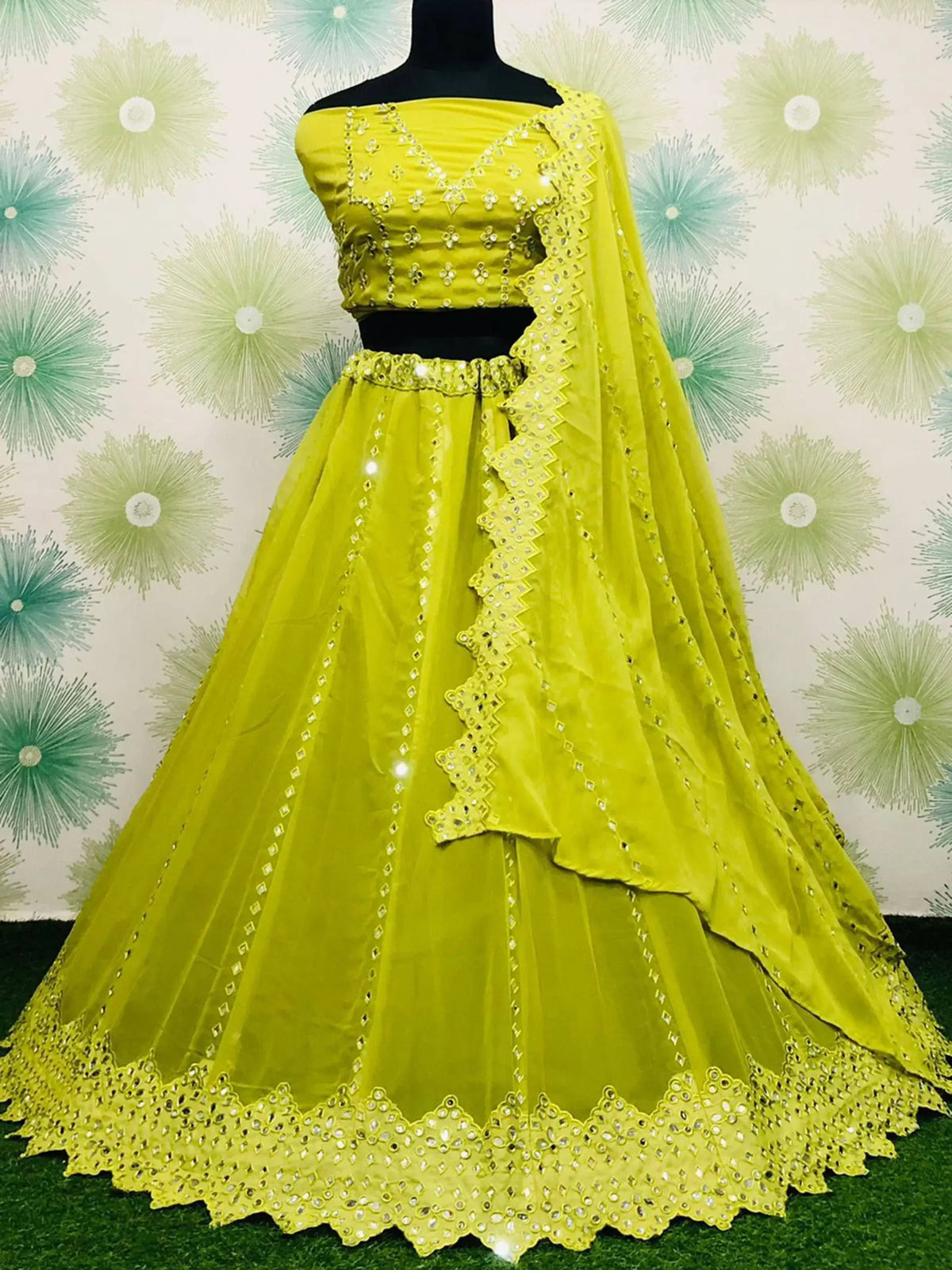 Pleasant Green Thread Embroidered Georgette Party Wear Lehenga Choli