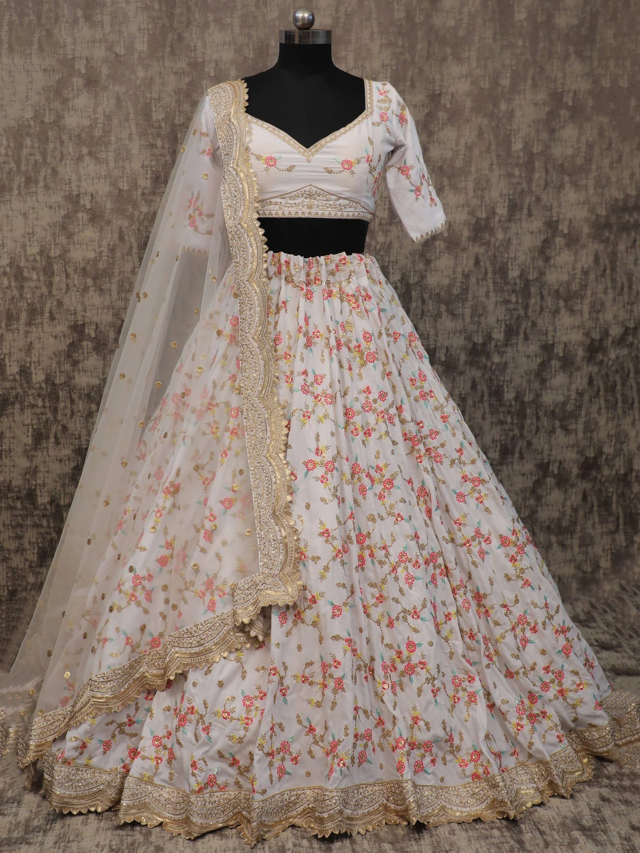 Awesome White Embroidery Chinon Silk Wedding Wear Lehenga Choli