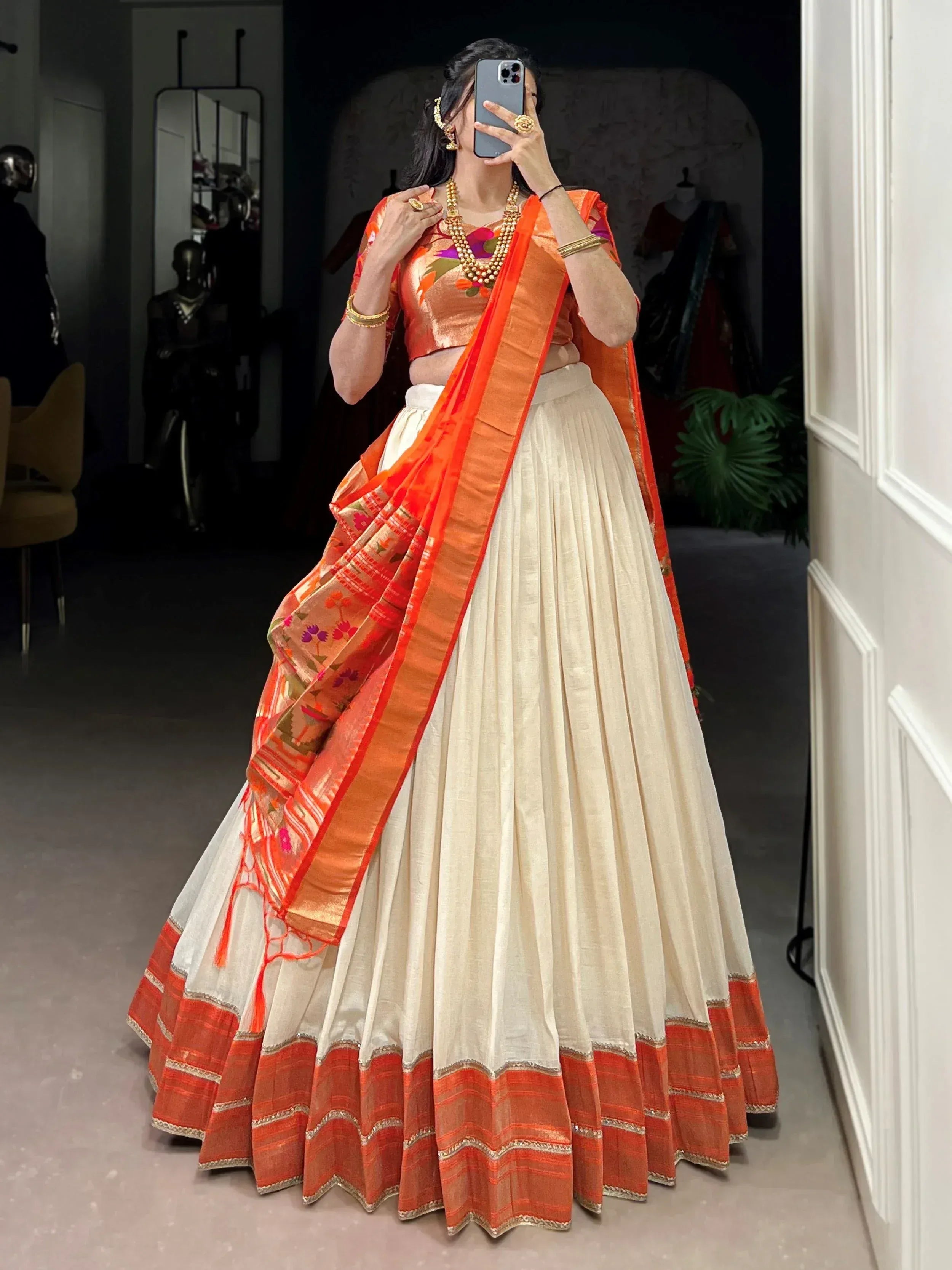 Orange floral blouse with cream pleated lehenga and matching dupatta, Indian ethnic wear