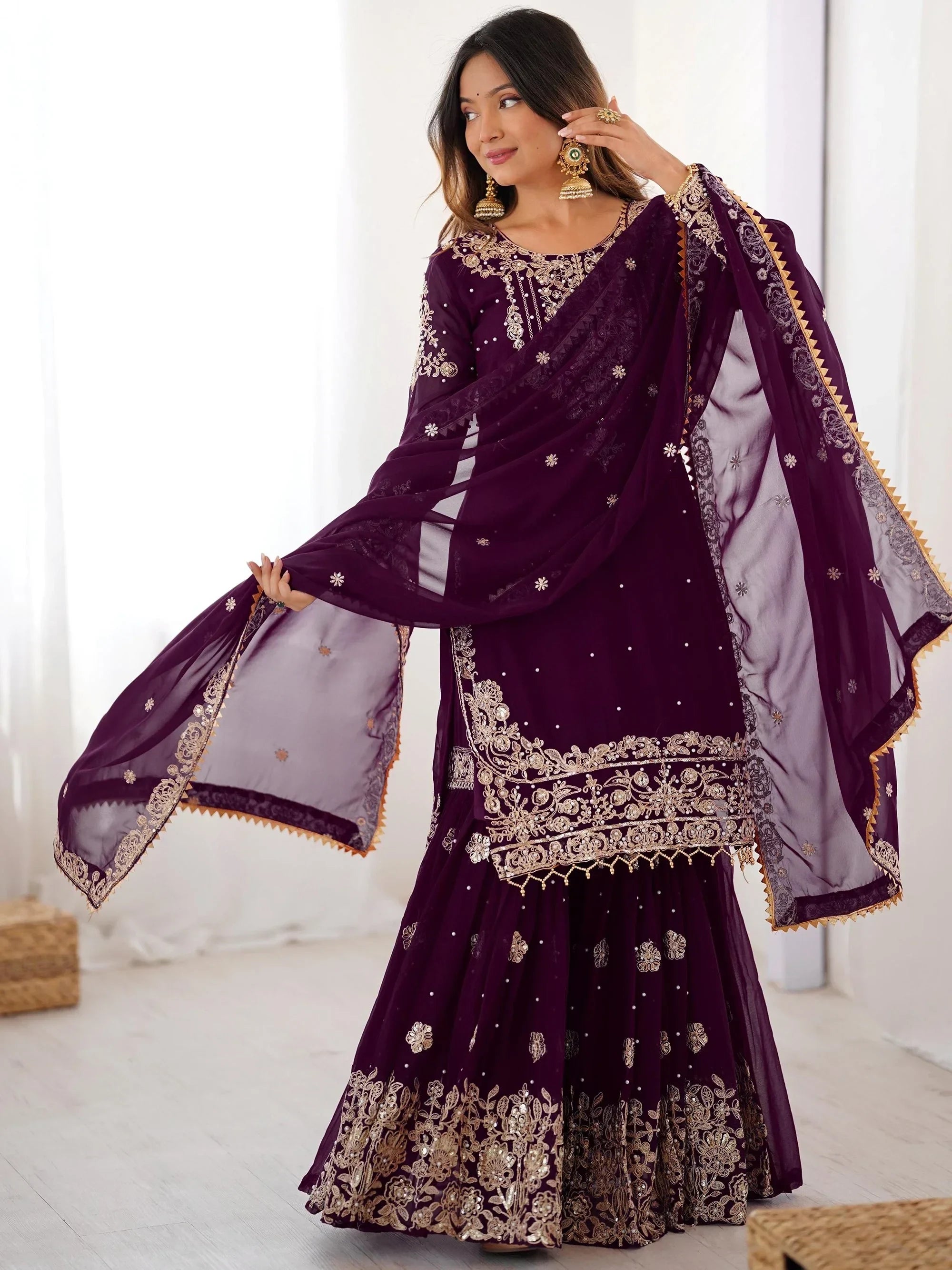 Glamorous Wine Embroidered Georgette Function Wear Sharara Suit 