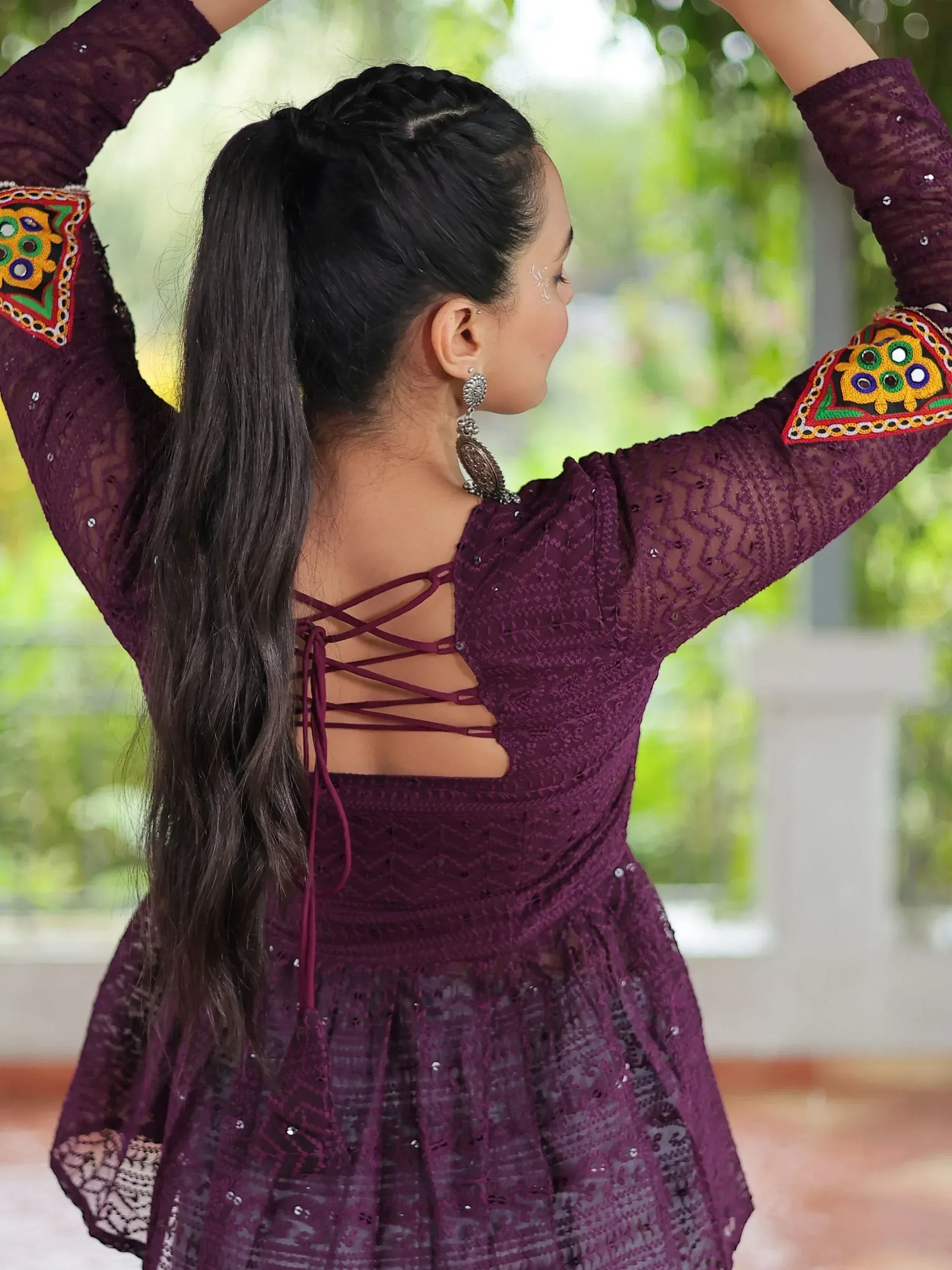 Purple ethnic gown with lace, mirror work, and back crisscross design for women