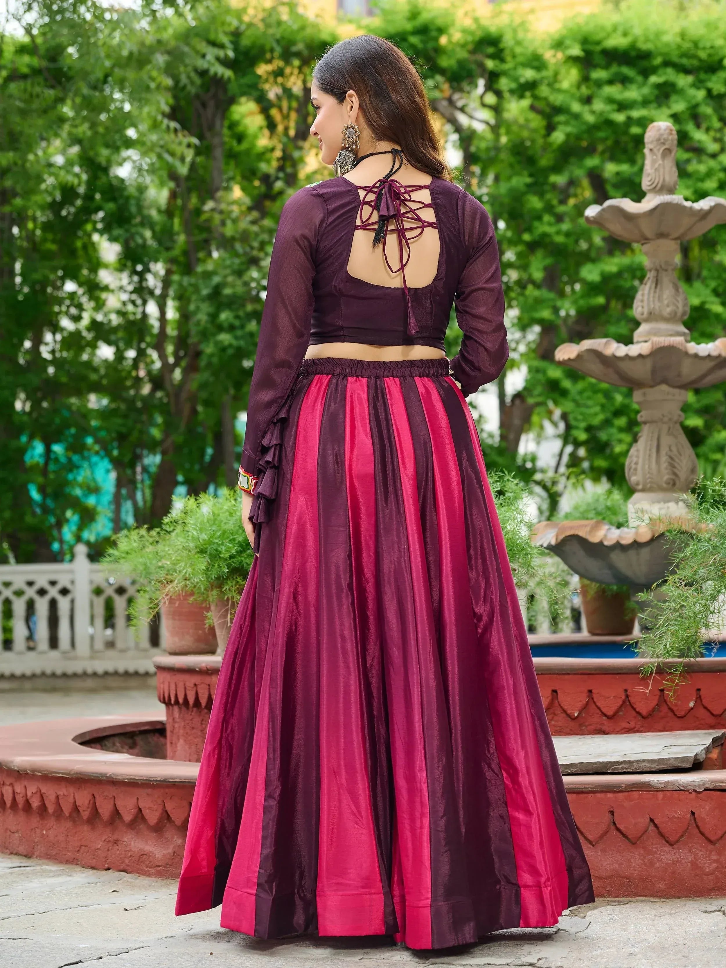 Purple and pink striped ethnic lehenga with back tie blouse, garden setting