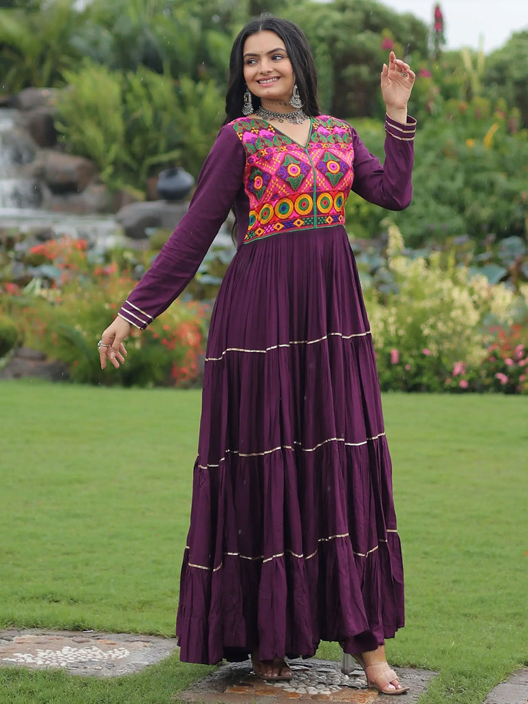 Adorable Wine Rayon Mirror Work Navratri Wear Layered Gown