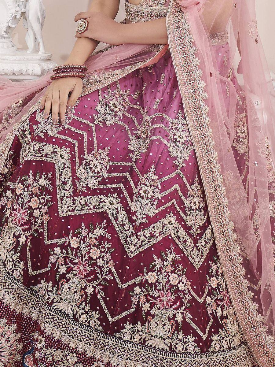 Pink and maroon embroidered lehenga choli with floral zari work and sheer dupatta, perfect for Indian weddings