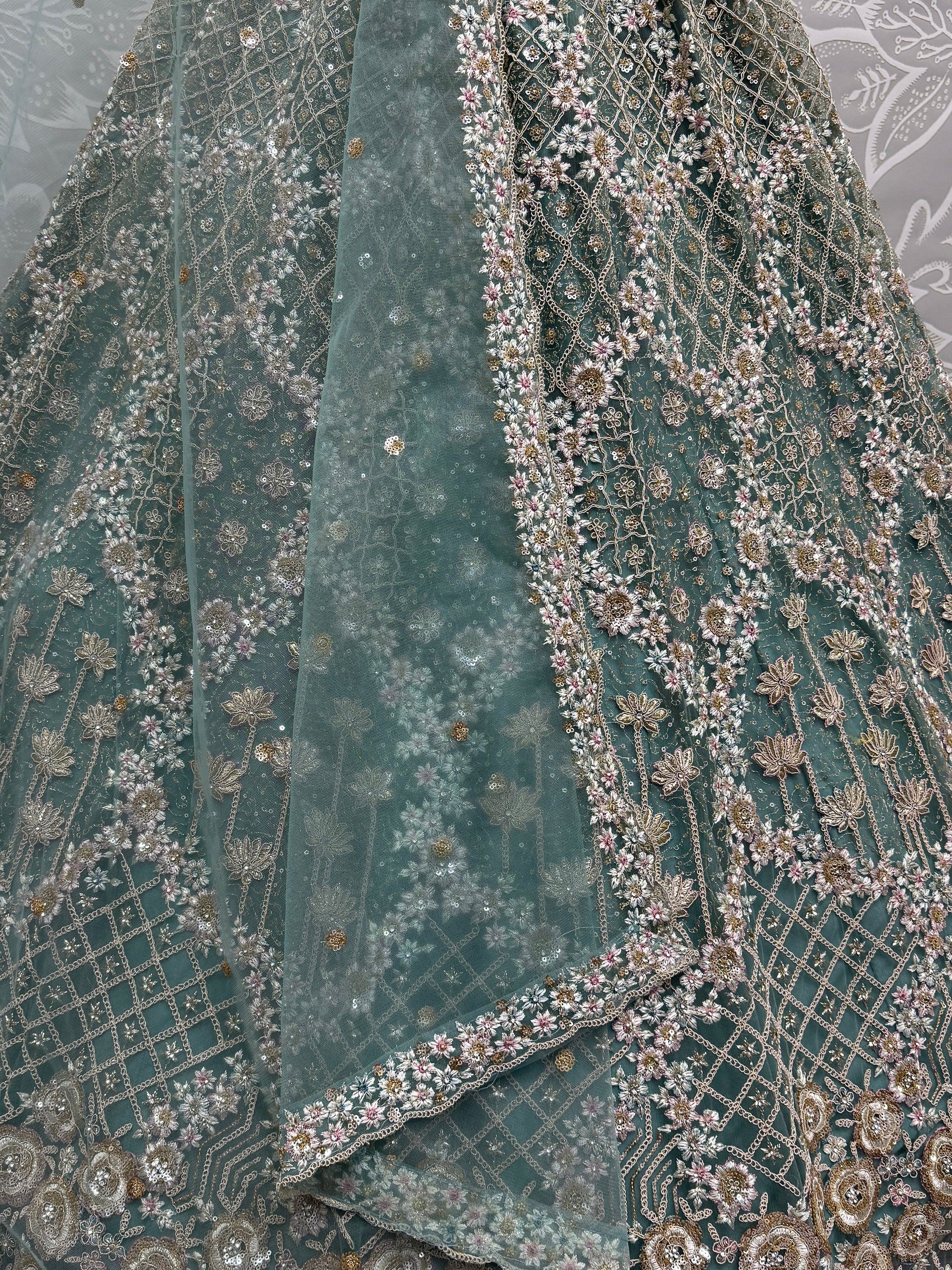 Teal designer lehenga with floral embroidery and sequin work, perfect for Indian ethnic wear